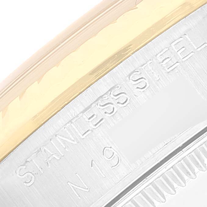 This is a close-up of the Rolex Mid-Size 68273 Women
s Steel and Gold (two tone) Champagne Dial 68273 Women
s Steel and Gold (two tone) Champagne Dial watch, showing the stainless steel back with engraved text.