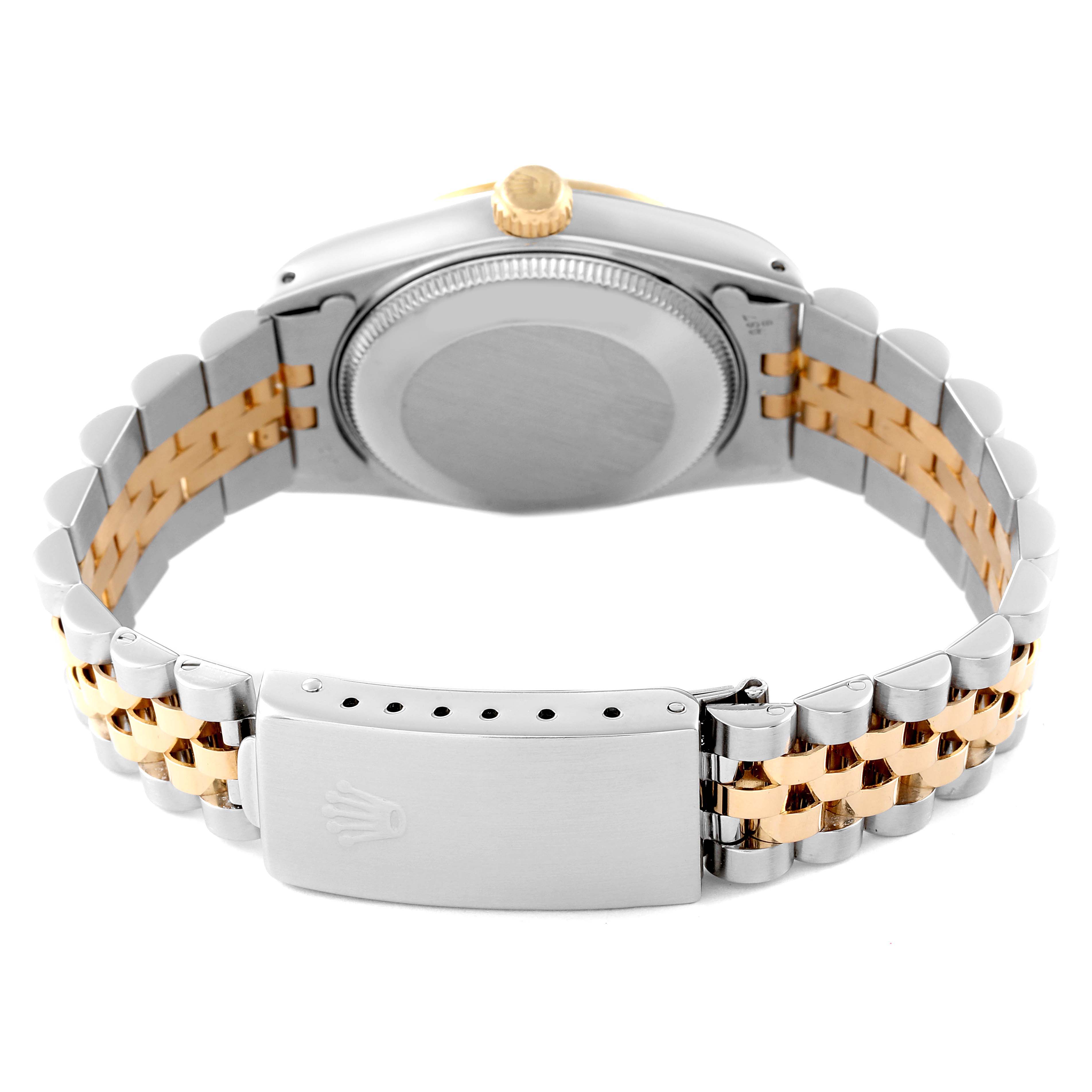 This image shows the back view of a Rolex Mid-Size 68273 Women
s Steel and Gold (two tone) Champagne Dial 68273 Women
s Steel and Gold (two tone) Champagne Dial watch, highlighting its two-tone bracelet and clasp.