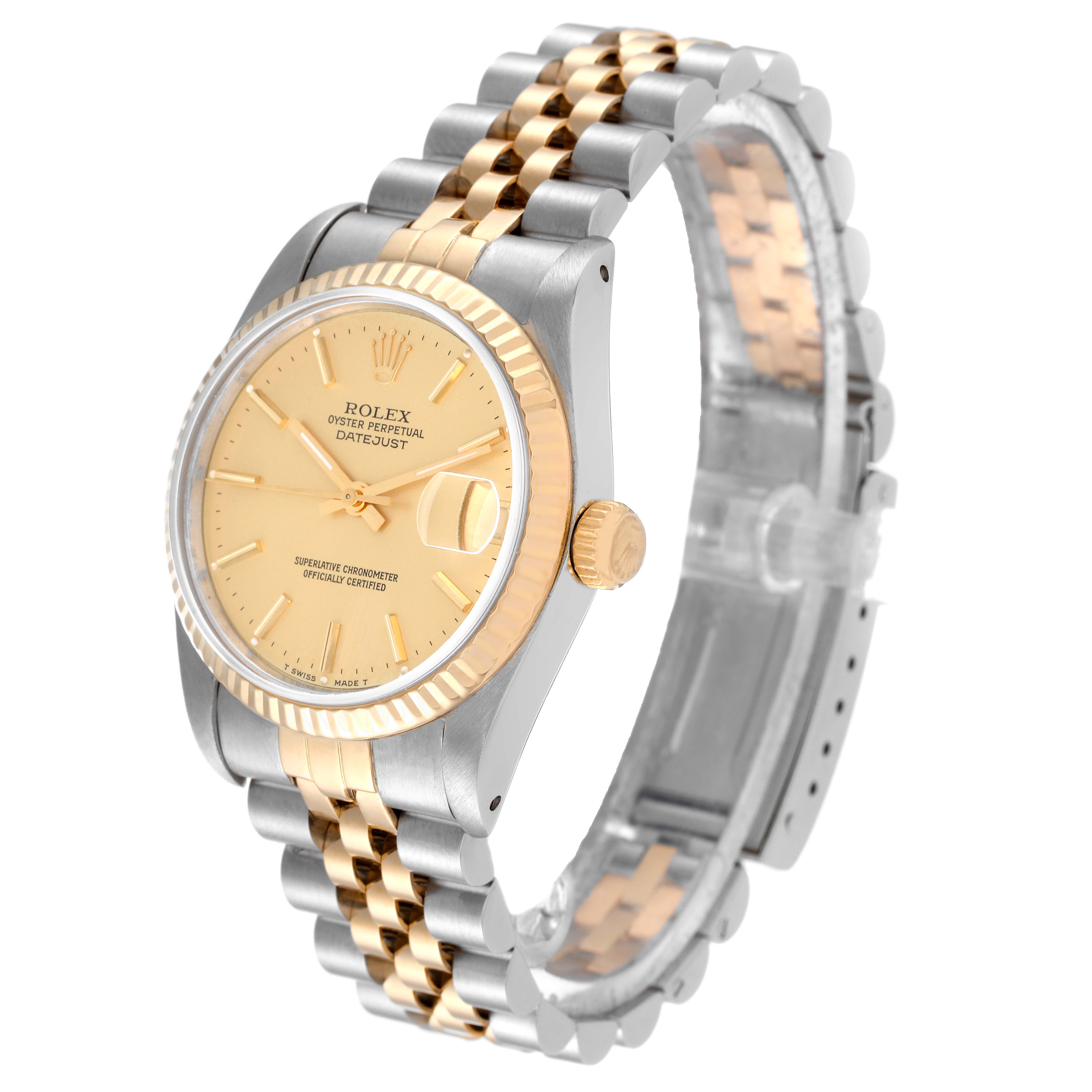 This image shows a Rolex Datejust Mid-Size watch at a three-quarter angle, highlighting its gold dial, fluted bezel, and two-tone bracelet.
