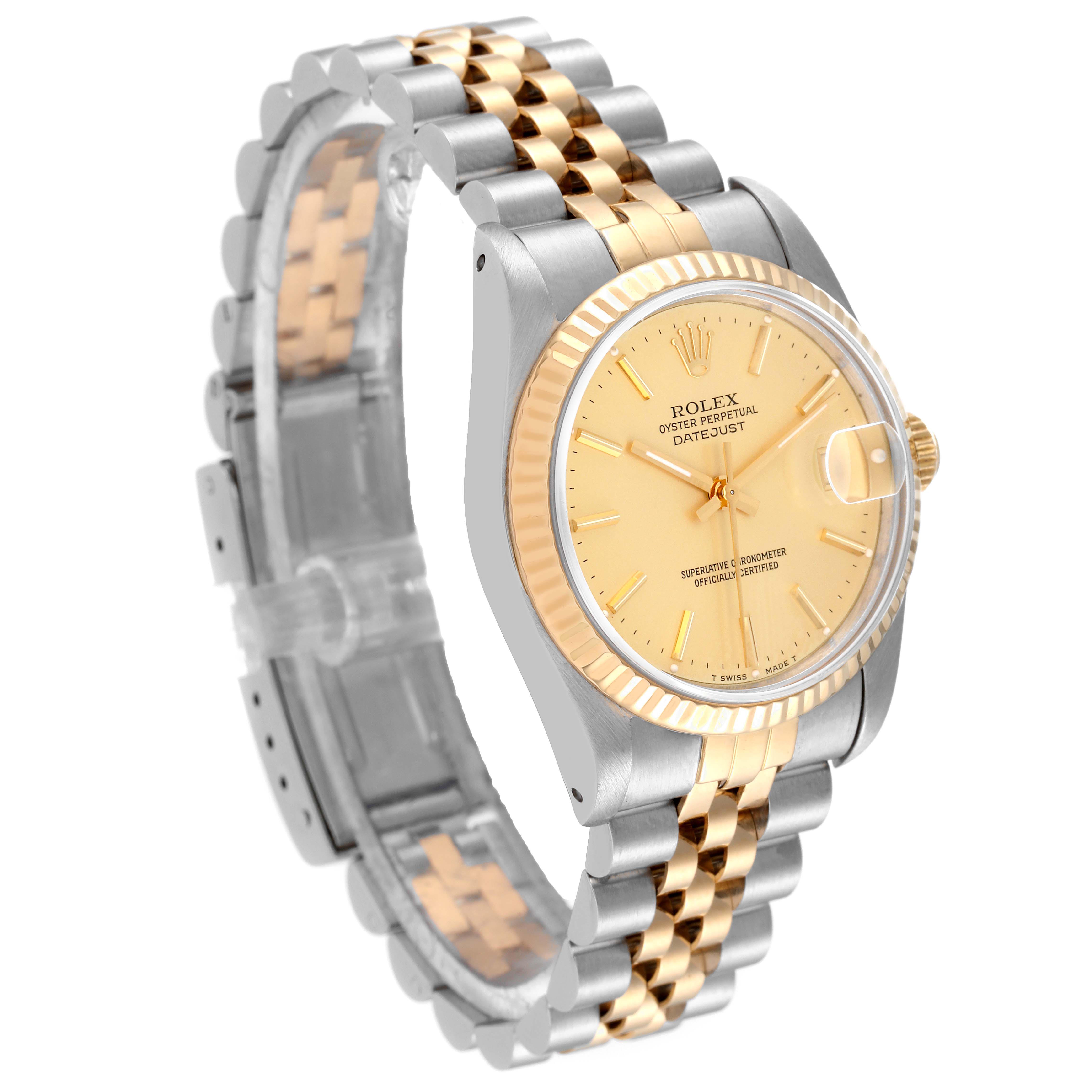 This Rolex Mid-Size 68273 Women
s Steel and Gold (two tone) Champagne Dial 68273 Women
s Steel and Gold (two tone) Champagne Dial Oyster Perpetual Datejust watch is shown at a 3/4 angle, showcasing the face, bracelet, bezel, and crown.