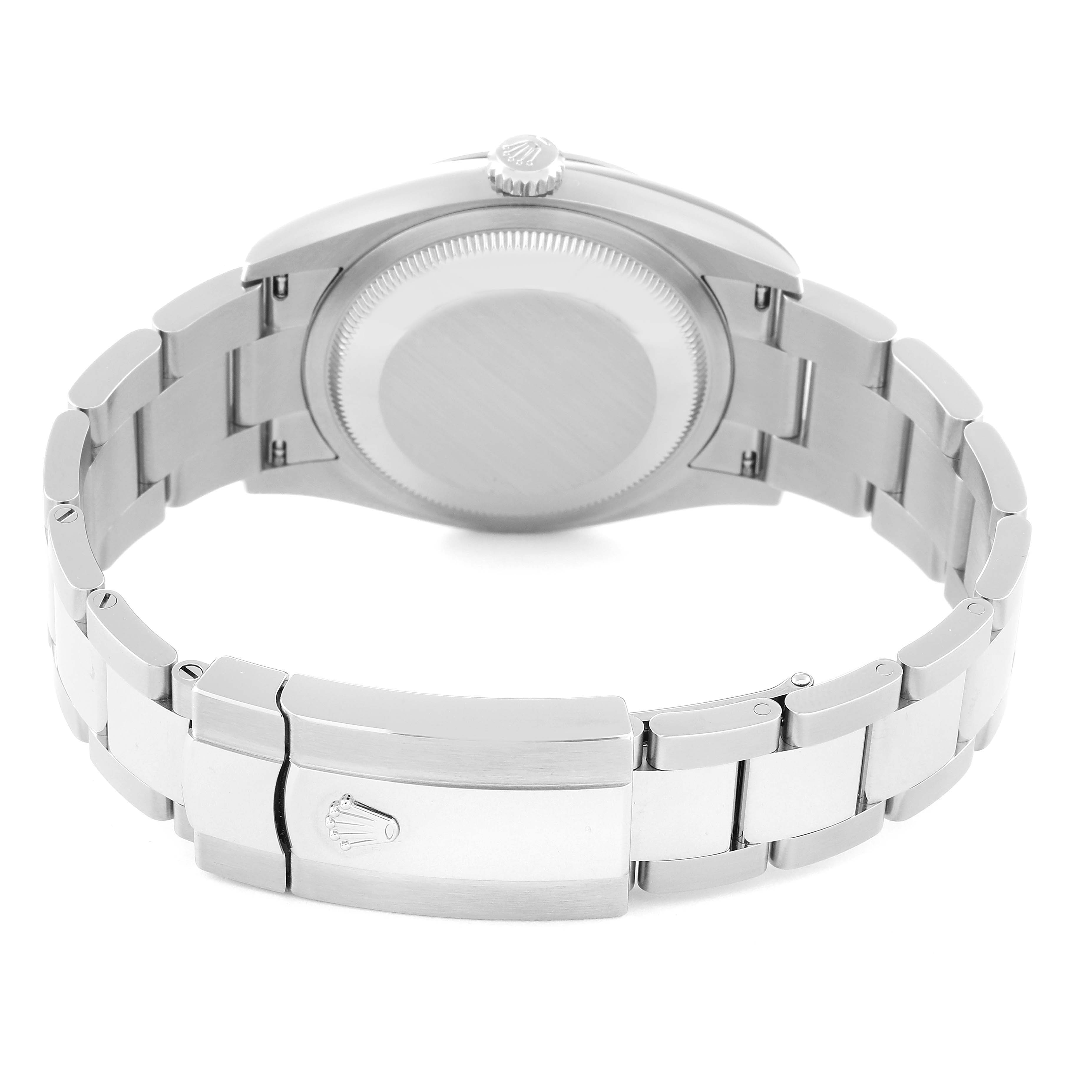 This image shows the back case, crown, and clasp of a Datejust model by Rolex, viewed from the rear angle.