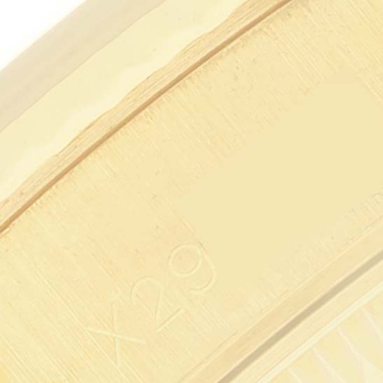 The image shows a close-up angle of part of the bracelet or casing of a Rolex President 69178 Women's Yellow Gold Blue Dial 69178 Women's Yellow Gold Blue Dial model watch.