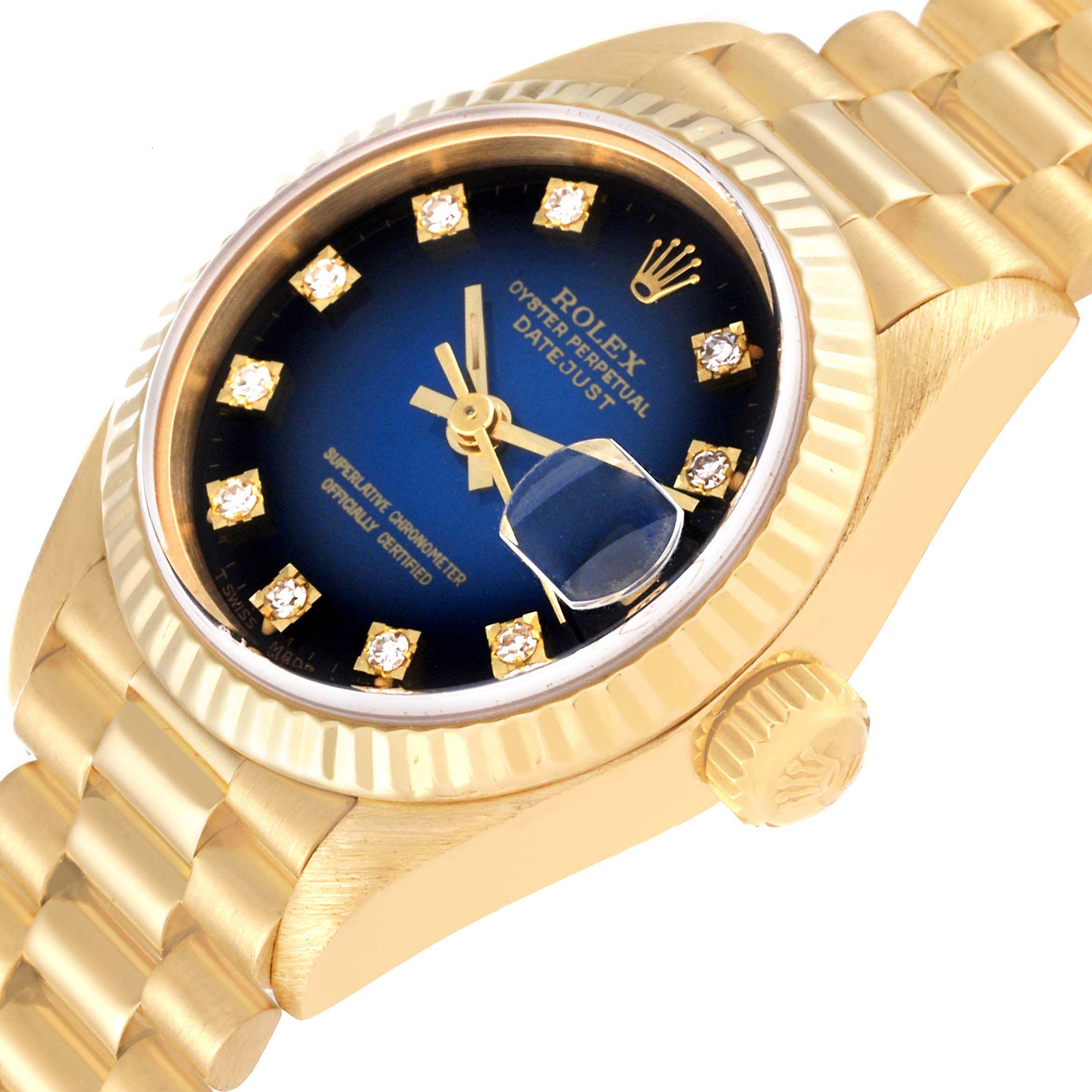 The image shows a Rolex President 69178 Women's Yellow Gold Blue Dial 69178 Women's Yellow Gold Blue Dial model watch at an angled view, highlighting its gold band, blue diamond-studded dial, and date magnifier.