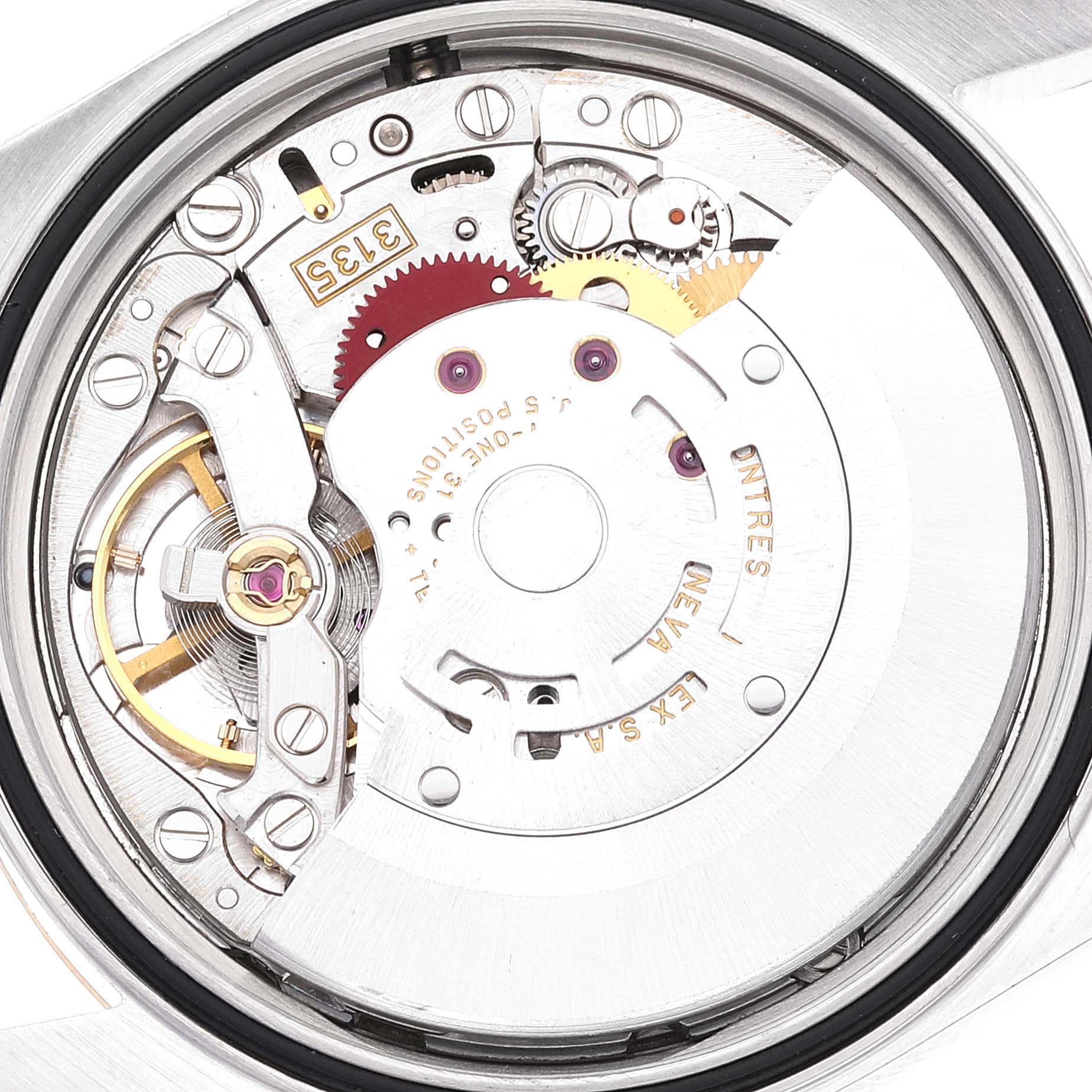 The image shows a close-up view of the Rolex Datejust 16233 Men's Steel and Gold (two tone) White Dial 16233 Men's Steel and Gold (two tone) White Dial's movement or mechanism from the back of the watch, highlighting its intricate components.