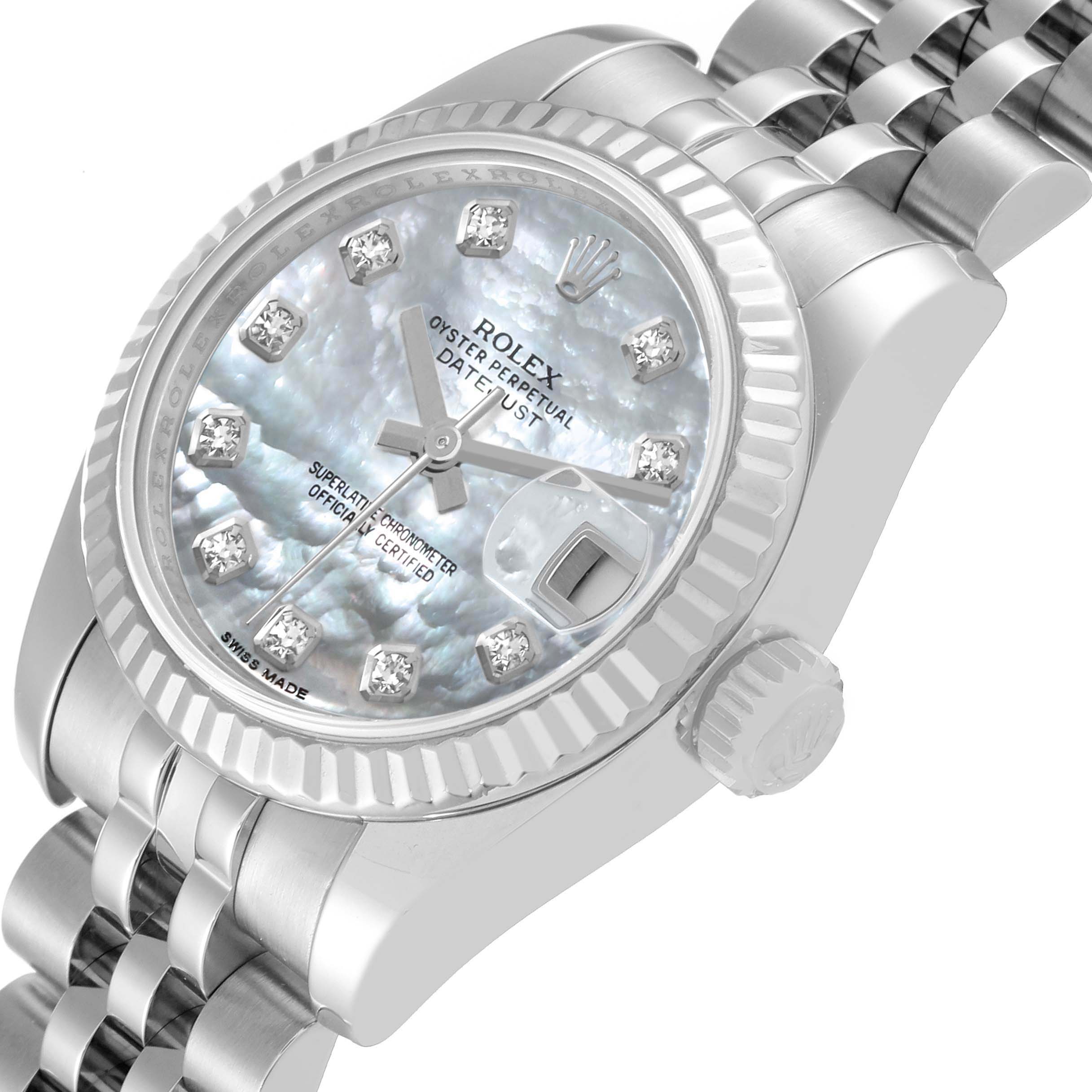 The Rolex Datejust 179174 Women's Stainless Steel Mother of Pearl Dial 179174 Women's Stainless Steel Mother of Pearl Dial is shown at a three-quarter angle, highlighting the dial, fluted bezel, crown, and part of the Jubilee bracelet.