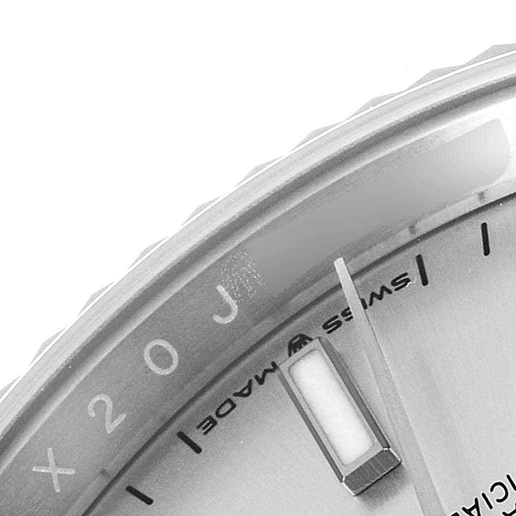 The image shows a close-up of the dial and bezel of the Rolex Datejust 126234 Men's Stainless Steel Silver Dial 126234 Men's Stainless Steel Silver Dial watch, highlighting the minute markers and part of the lume.