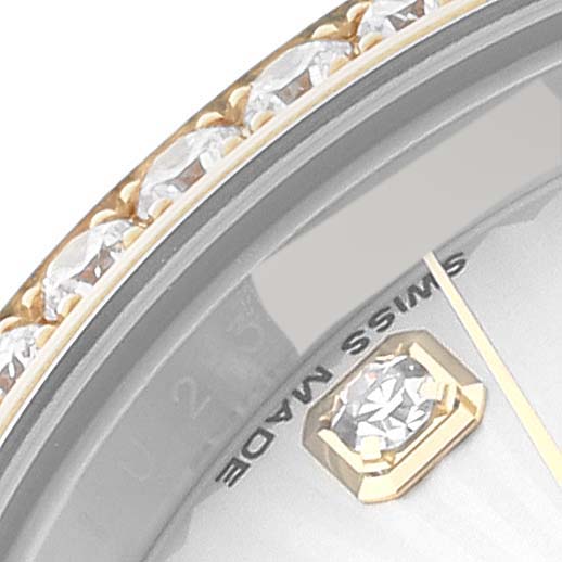 This image shows a close-up of the bezel, diamond indices, and dial portion of a Rolex Datejust 179383 Women's Steel and Gold (two tone) Silver Dial 179383 Women's Steel and Gold (two tone) Silver Dial watch.