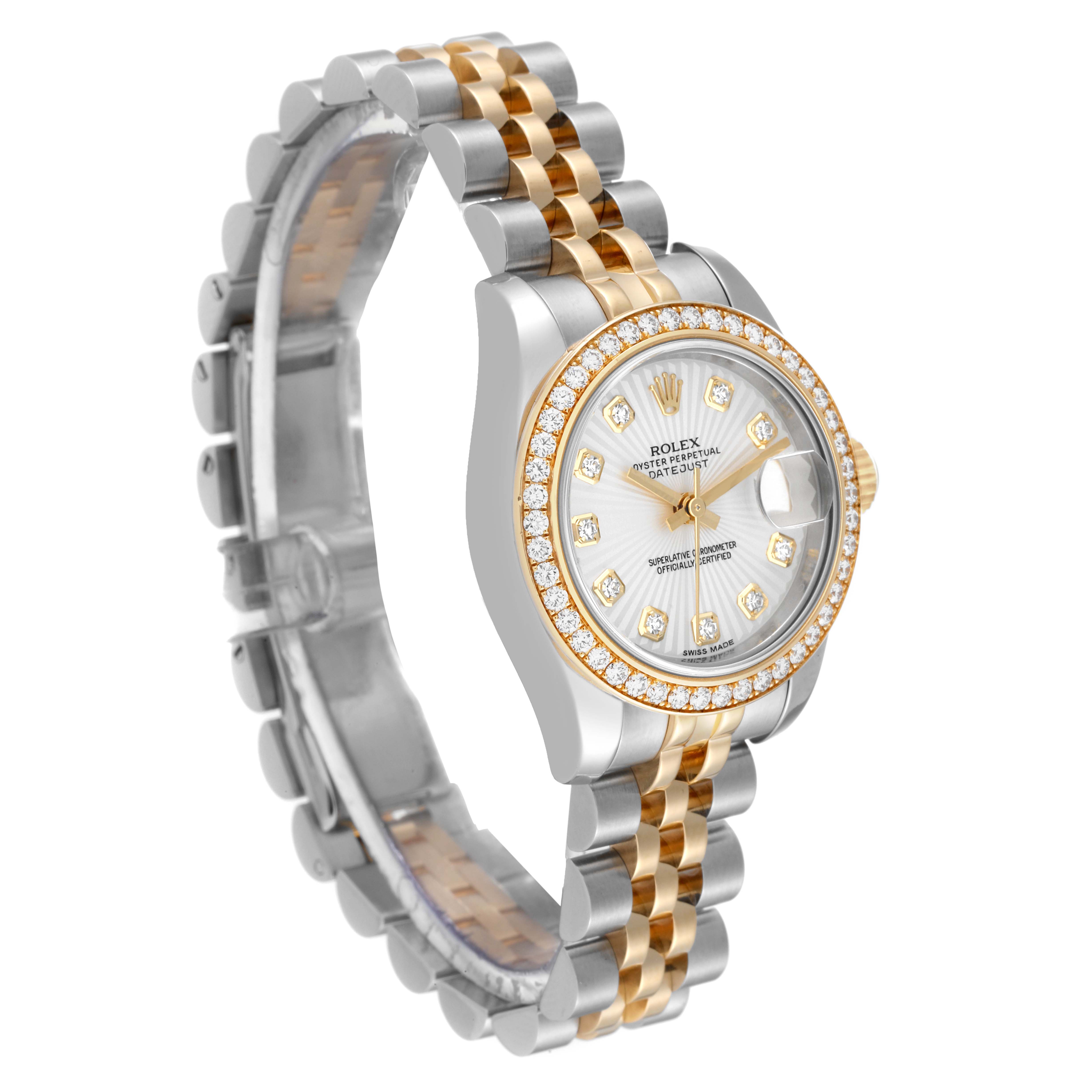 The Rolex Datejust 179383 Women's Steel and Gold (two tone) Silver Dial 179383 Women's Steel and Gold (two tone) Silver Dial watch is shown at a slight angle, highlighting its two-tone bracelet and diamond-studded dial and bezel.