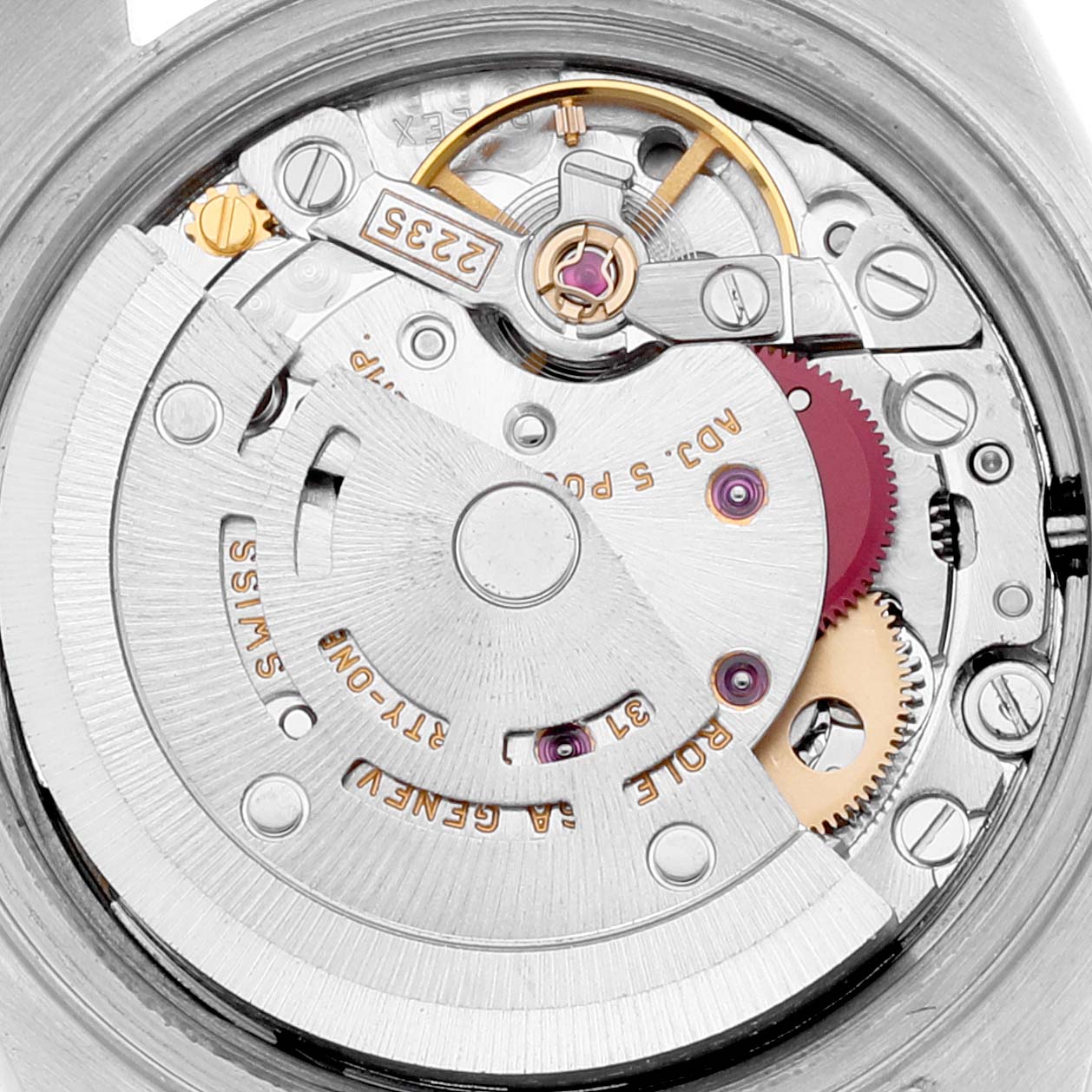 This image shows the internal mechanical movement of a Rolex Datejust 79173 Women's Steel and Gold (two tone) Mother of Pearl Dial 79173 Women's Steel and Gold (two tone) Mother of Pearl Dial watch, including gears and the balance wheel, viewed from the back.