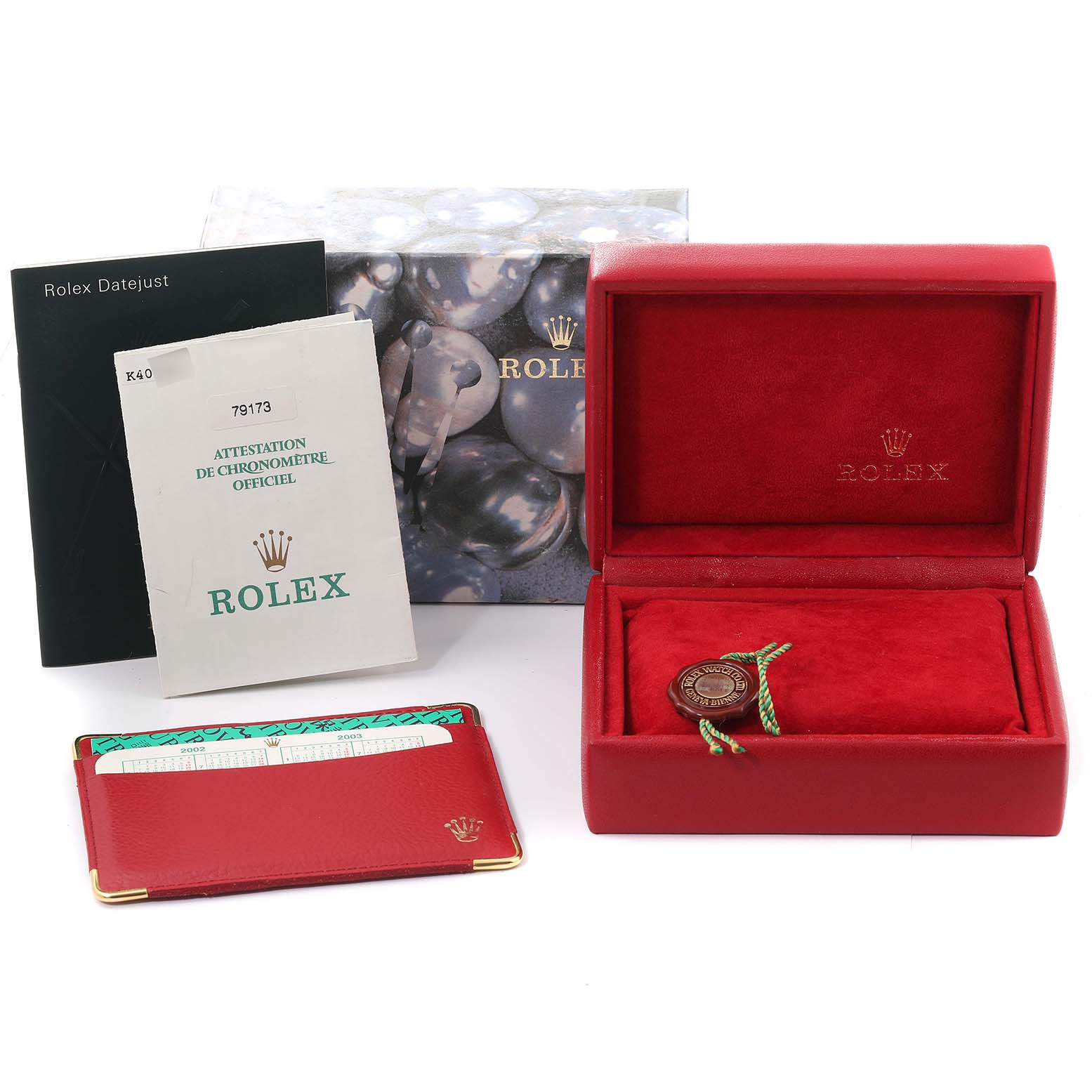 The image shows accessories for a Rolex Datejust 79173 Women
s Steel and Gold (two tone) Mother of Pearl Dial 79173 Women
s Steel and Gold (two tone) Mother of Pearl Dial, including the box, manuals, and Best Quality
ation card.