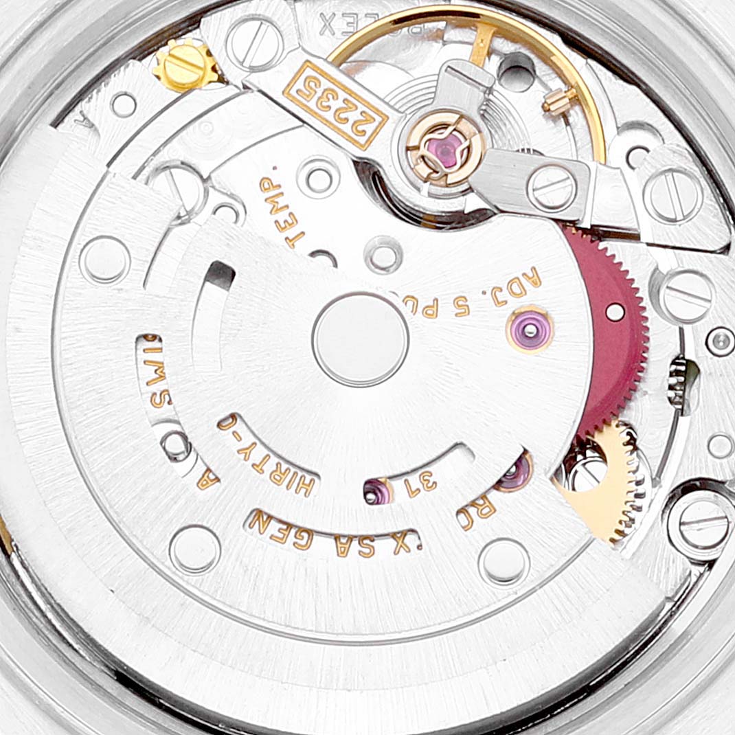 The image shows a close-up of the movement and inner mechanical parts of a Rolex Datejust 79173 Women's Steel and Gold (two tone) Blue Dial 79173 Women's Steel and Gold (two tone) Blue Dial watch.