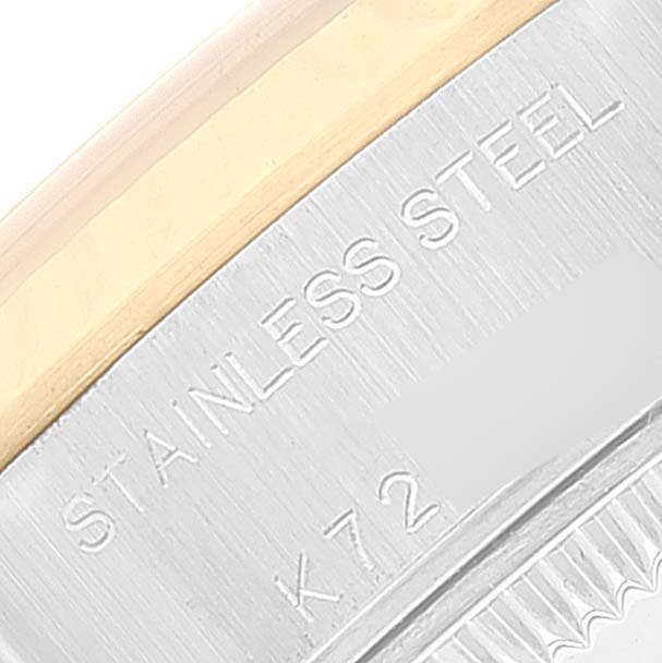 This close-up image shows the side of the stainless steel casing of a Rolex Datejust 79173 Women's Steel and Gold (two tone) Blue Dial 79173 Women's Steel and Gold (two tone) Blue Dial watch.