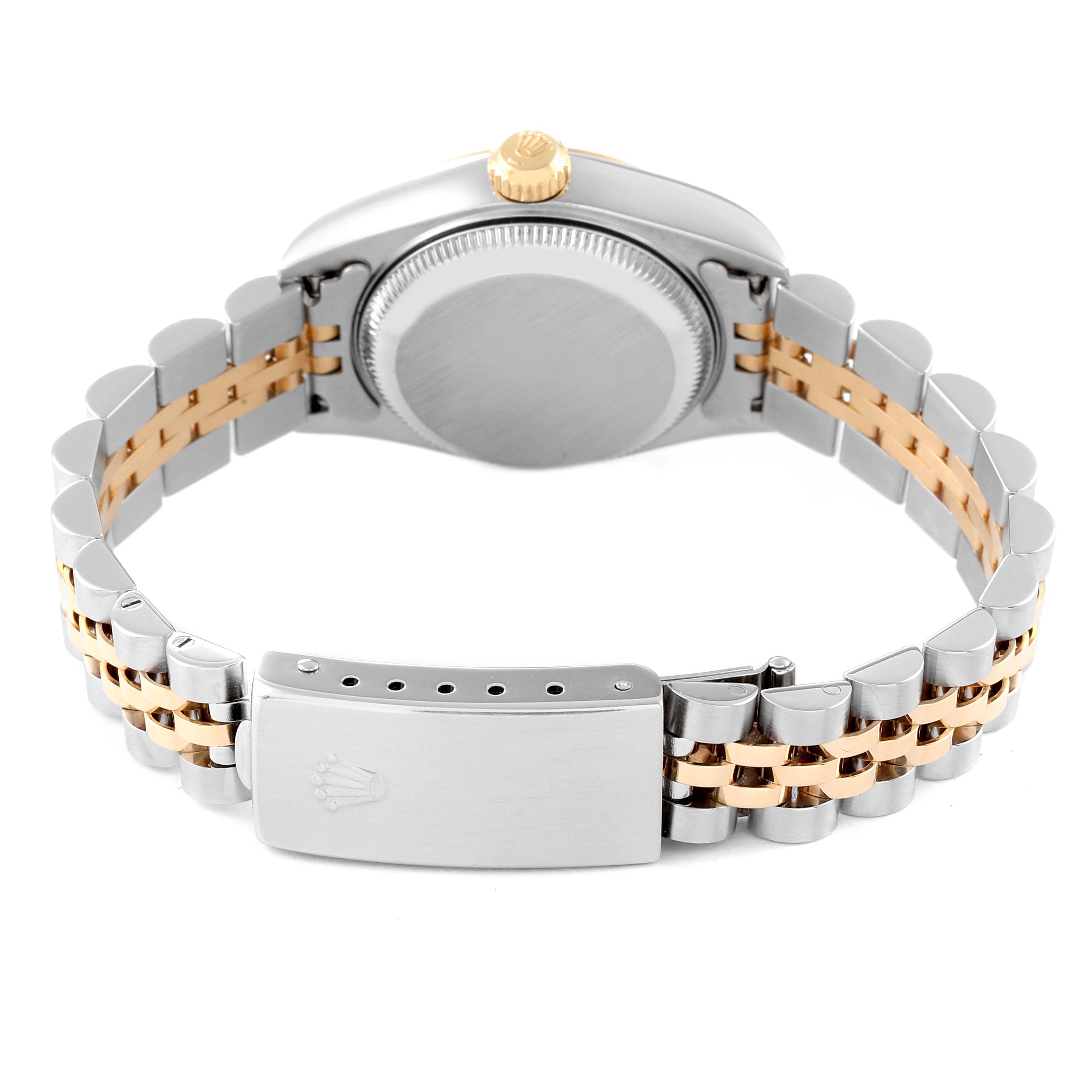 This image shows the underside of a Rolex Datejust 79173 Women's Steel and Gold (two tone) Blue Dial 79173 Women's Steel and Gold (two tone) Blue Dial watch, highlighting the bracelet, clasp, and case back.