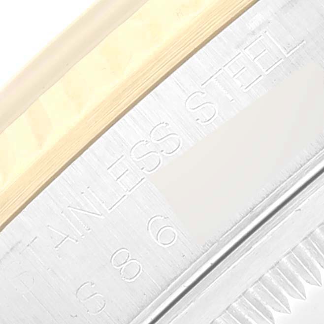 The image shows a close-up angle of the Rolex Datejust 16233 Men's Steel and Gold (two tone) White Dial 16233 Men's Steel and Gold (two tone) White Dial watch, focusing on the case side with "STAINLESS STEEL" engraving.