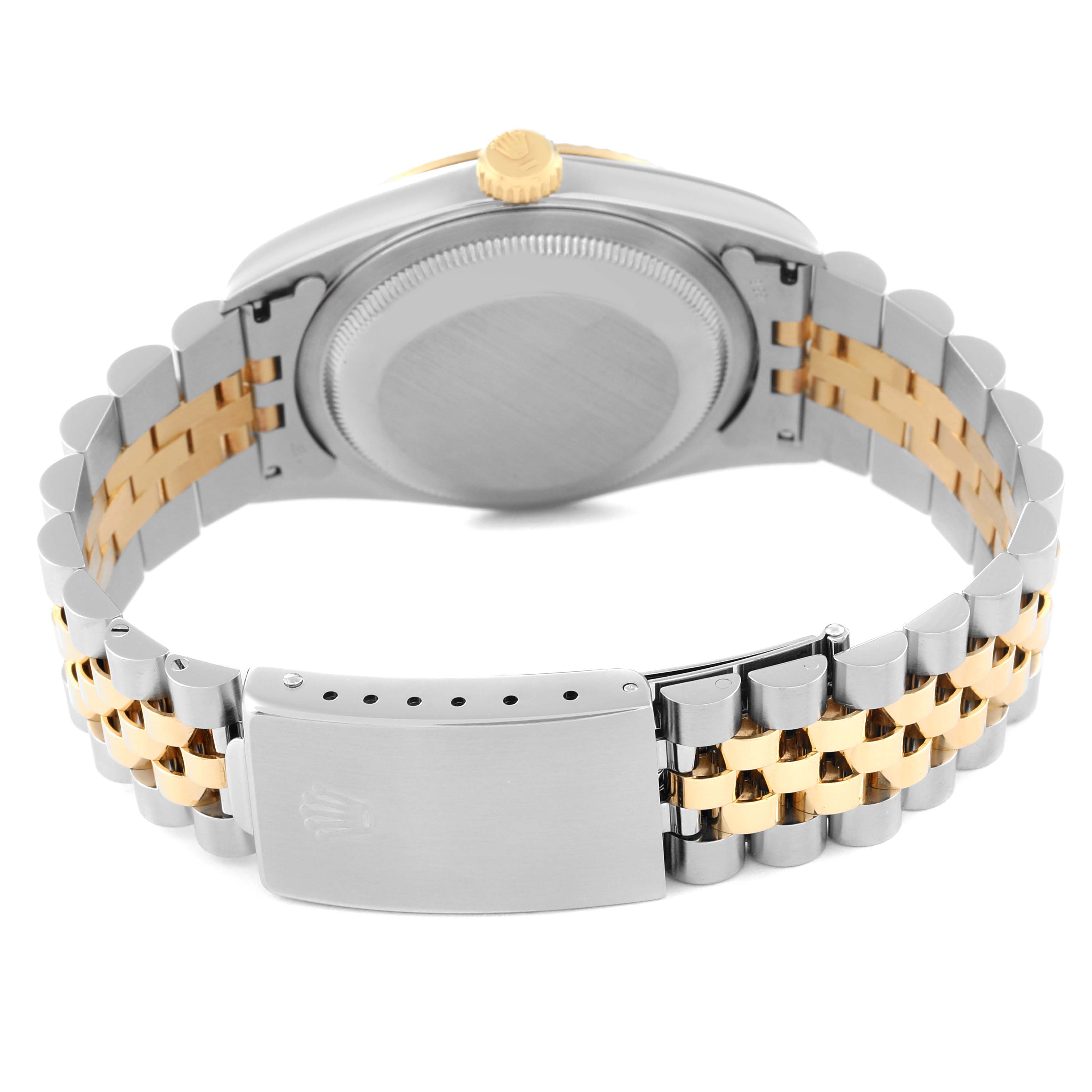 The image shows the back case, crown, and two-tone Jubilee bracelet of a Rolex Datejust 16233 Men's Steel and Gold (two tone) White Dial 16233 Men's Steel and Gold (two tone) White Dial watch from a rear angle.
