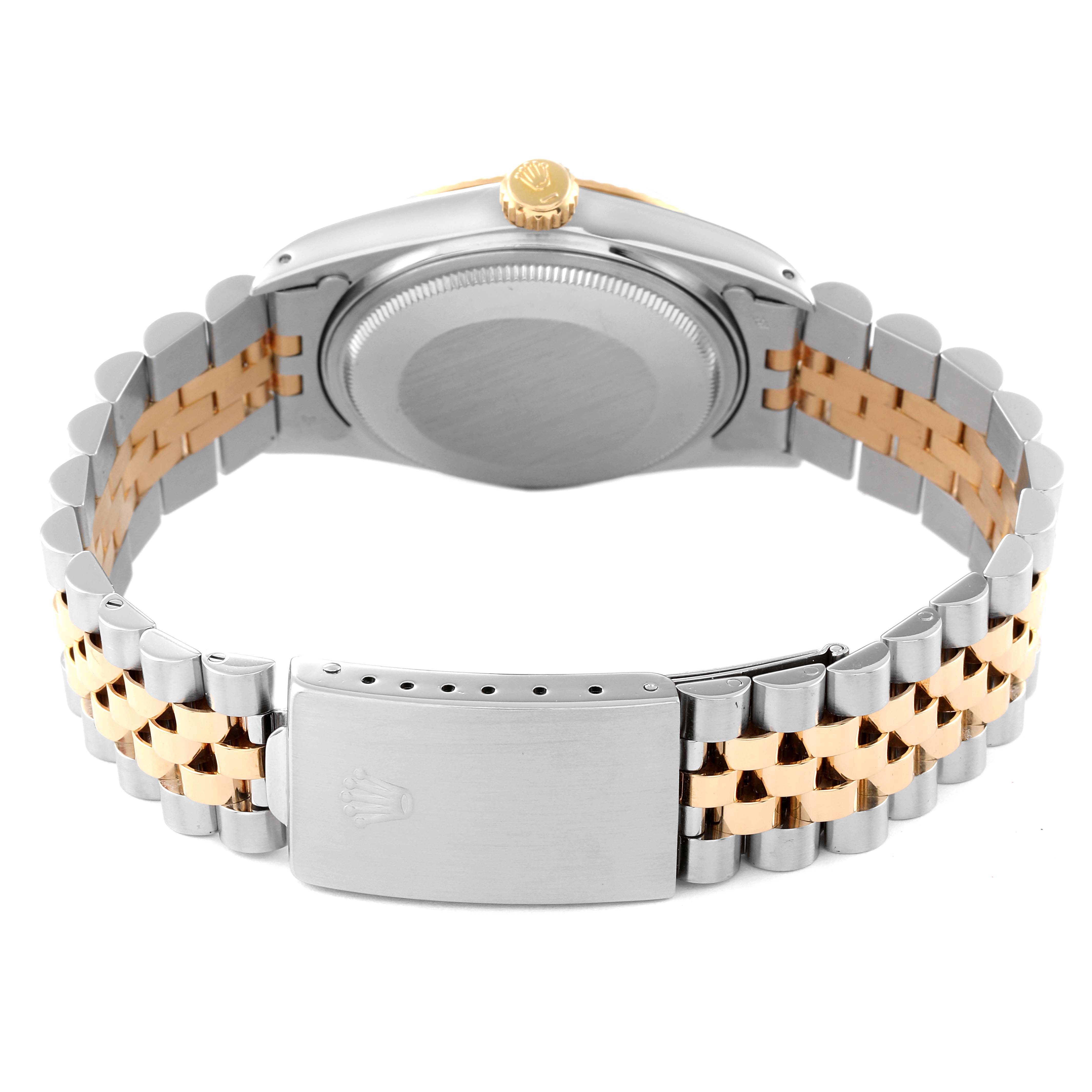 This image shows the back and side profile of a Vintage Collection Rolex watch, highlighting the clasp and band.