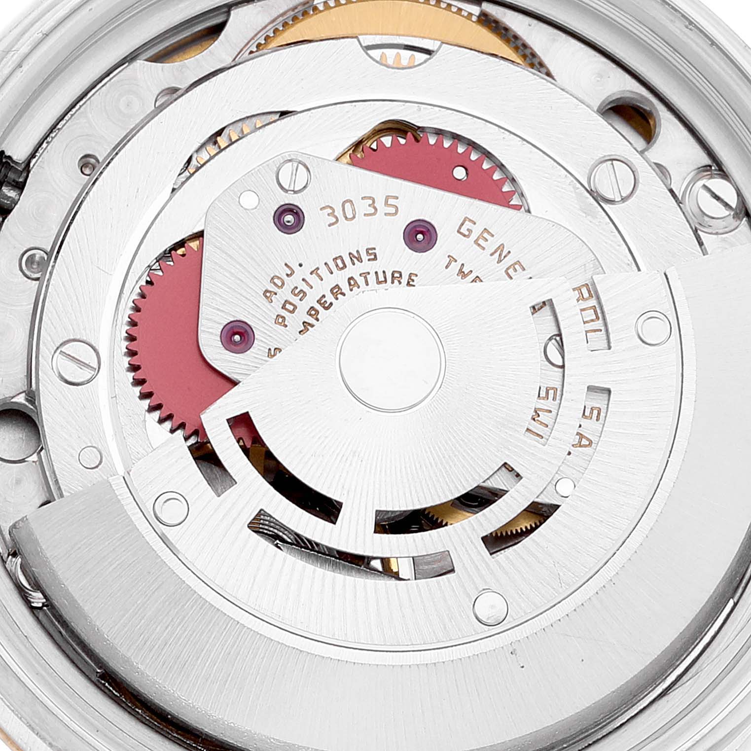 The image shows the detailed internal mechanics of a Rolex Vintage Collection 16013 Men's Steel and Gold (two tone) White Dial 16013 Men's Steel and Gold (two tone) White Dial watch, specifically the rotor and gears.