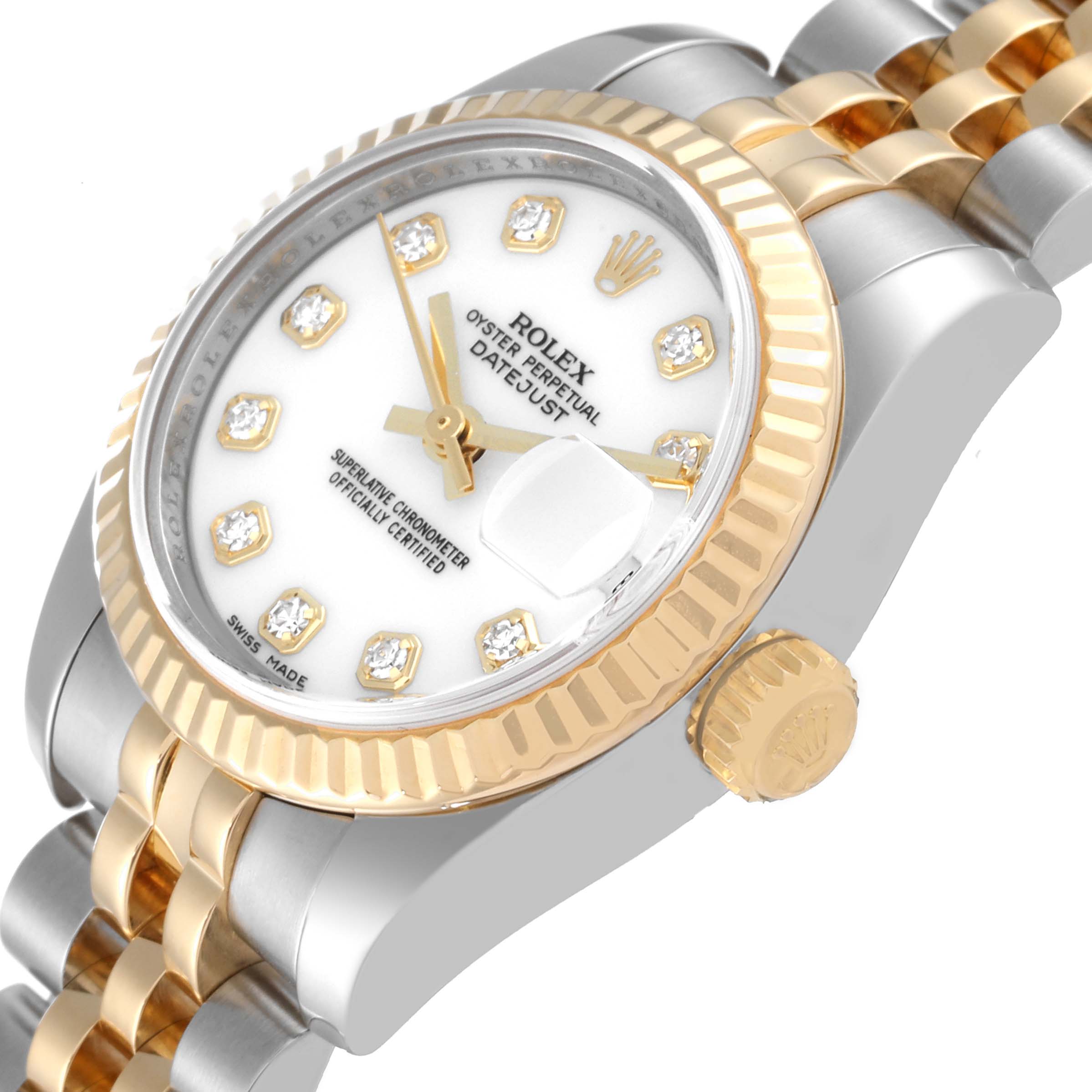 The image shows a close-up, angled view of a Rolex Datejust 179173 Women's Steel and Gold (two tone) White Dial 179173 Women's Steel and Gold (two tone) White Dial watch, highlighting its face, bezel, crown, and bracelet.