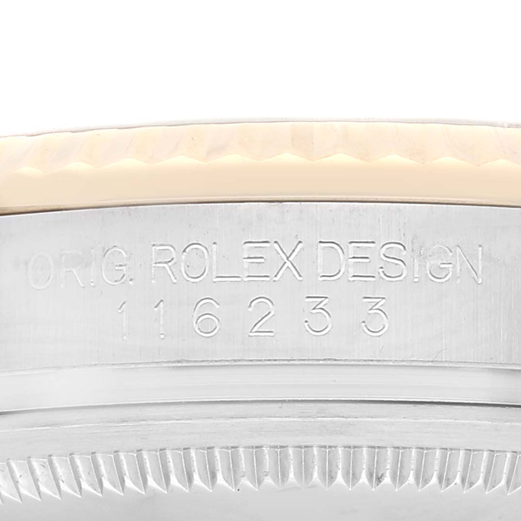 The image shows a close-up of the case side of a Rolex Datejust 116233 Men's Steel and Gold (two tone) White Dial 116233 Men's Steel and Gold (two tone) White Dial, displaying the model number engraving "116233".