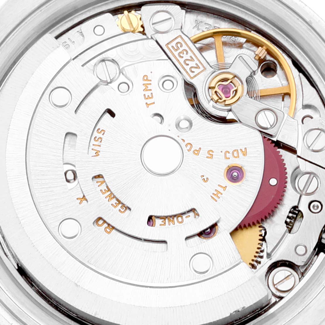This image shows a close-up of the movement mechanism of a Rolex Datejust 179174 Women's Stainless Steel Black Dial 179174 Women's Stainless Steel Black Dial watch taken from the back.