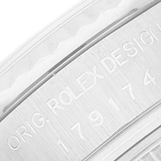 This image shows a close-up of the engraved "ORIG. ROLEX DESIGN" text on the Datejust model by Rolex.