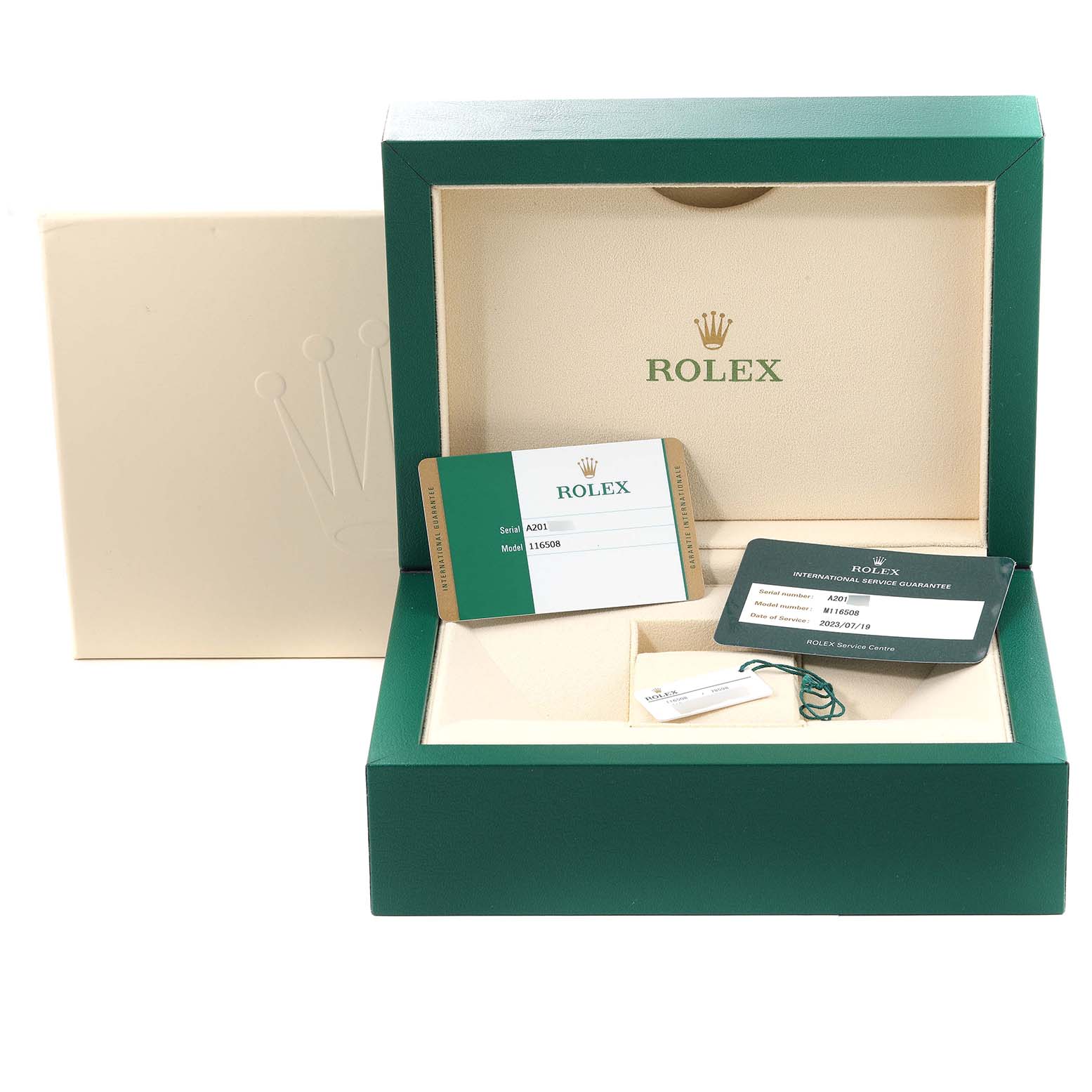 The image shows the Rolex Daytona 116508 Men
s Yellow Gold Green Dial 116508 Men
s Yellow Gold Green Dial watch packaging, including the box, service guarantee card, and model documentation.
