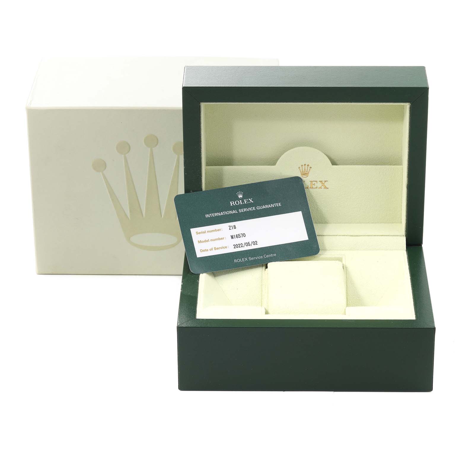 The image shows a Rolex Explorer 16570 Men
s Stainless Steel Black Dial 16570 Men
s Stainless Steel Black Dial watch box and service guarantee card, with the box open at an angle revealing the interior.