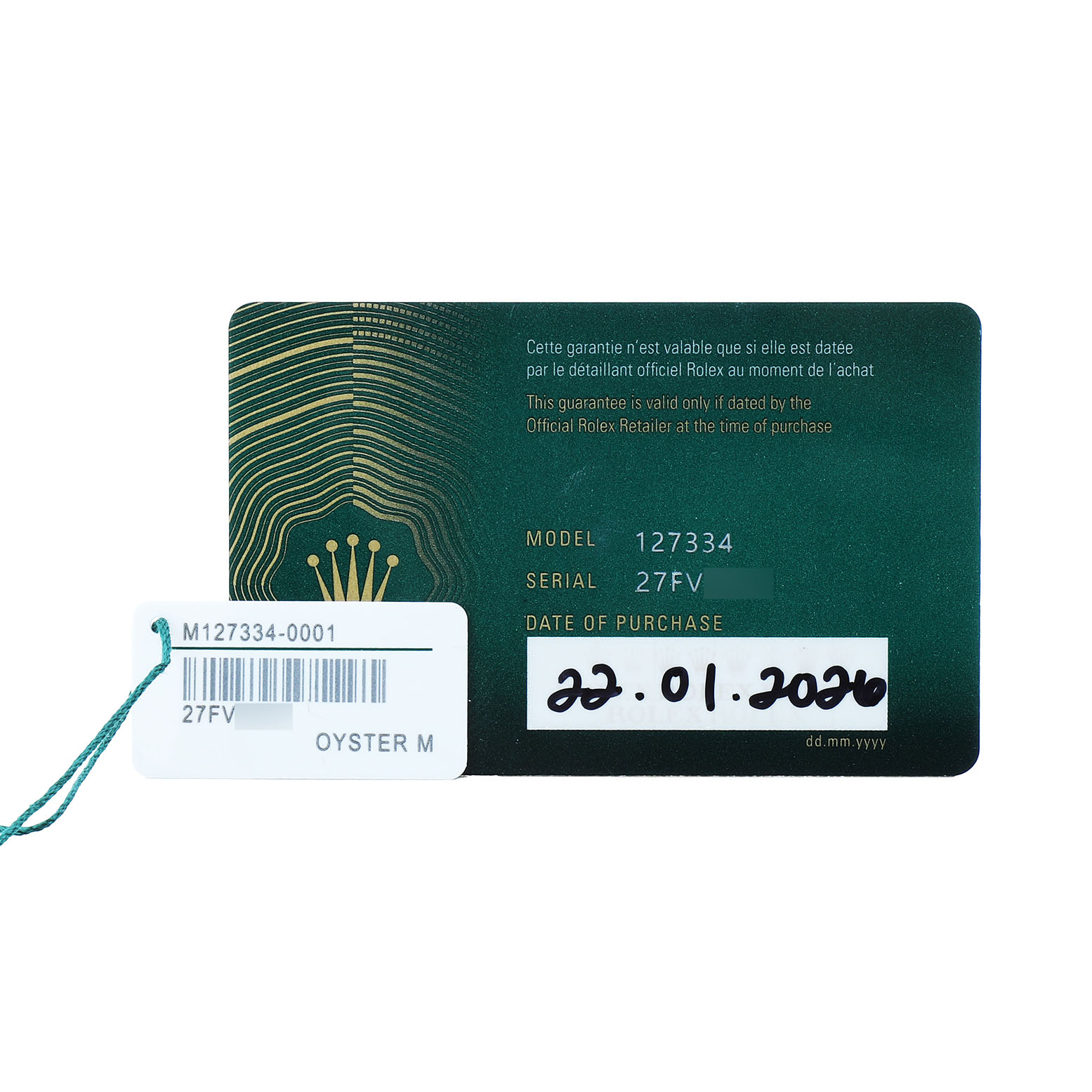 The image shows a warranty card for the Rolex Land‑Dweller 127334 Men's Stainless Steel White Dial model, featuring model, serial numbers, and purchase date.