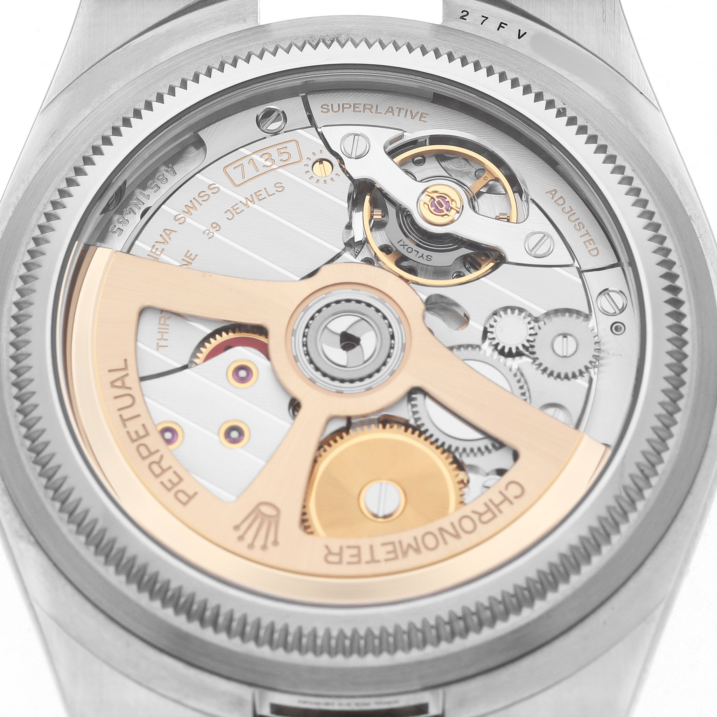 The image shows the back view of the Rolex Land-Dweller, highlighting its intricate movement and rotor.