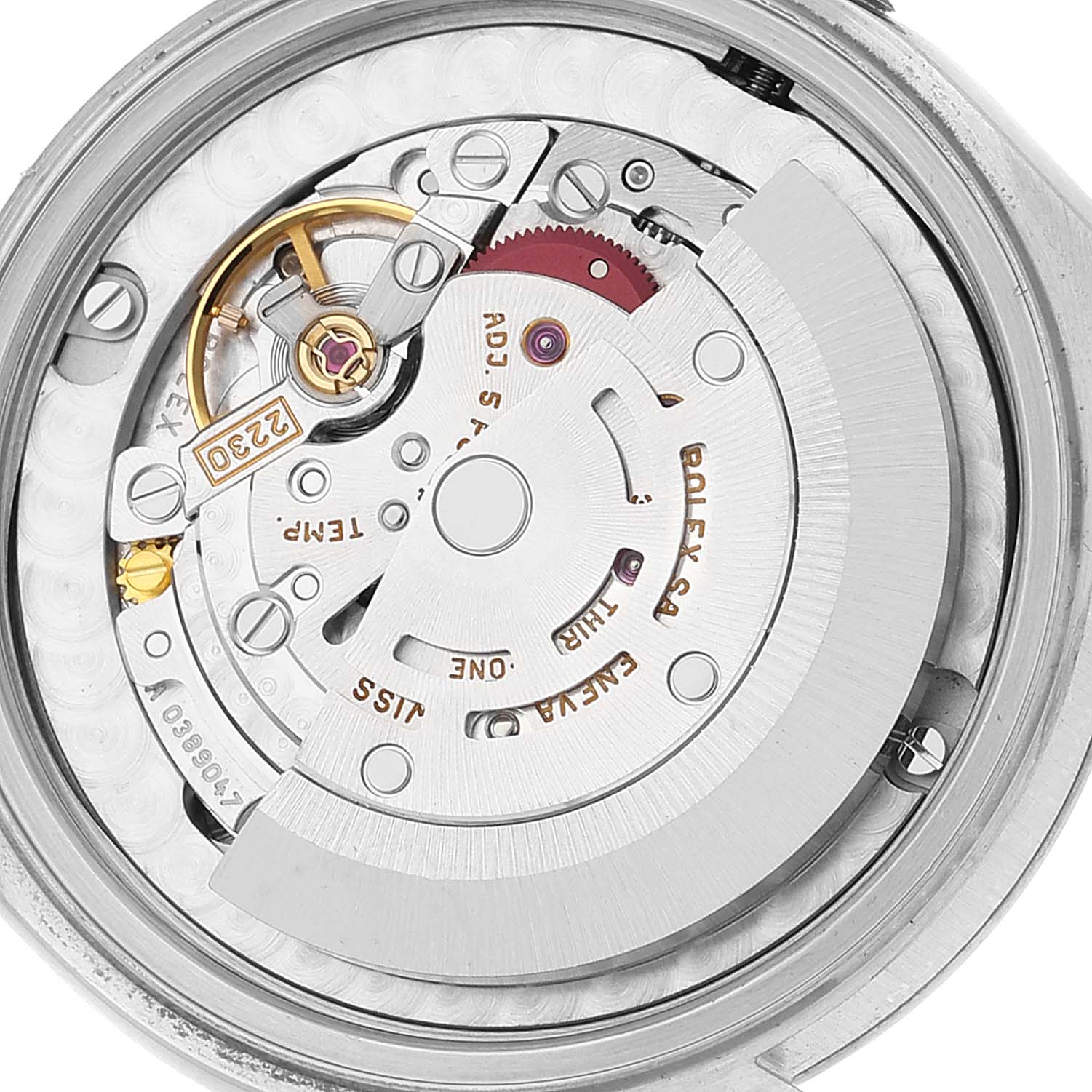 This image shows a close-up of the internal movement mechanism of a Rolex Mid-Size 77483 Women
s Steel and Gold (two tone) Grey Dial 77483 Women
s Steel and Gold (two tone) Grey Dial model watch.