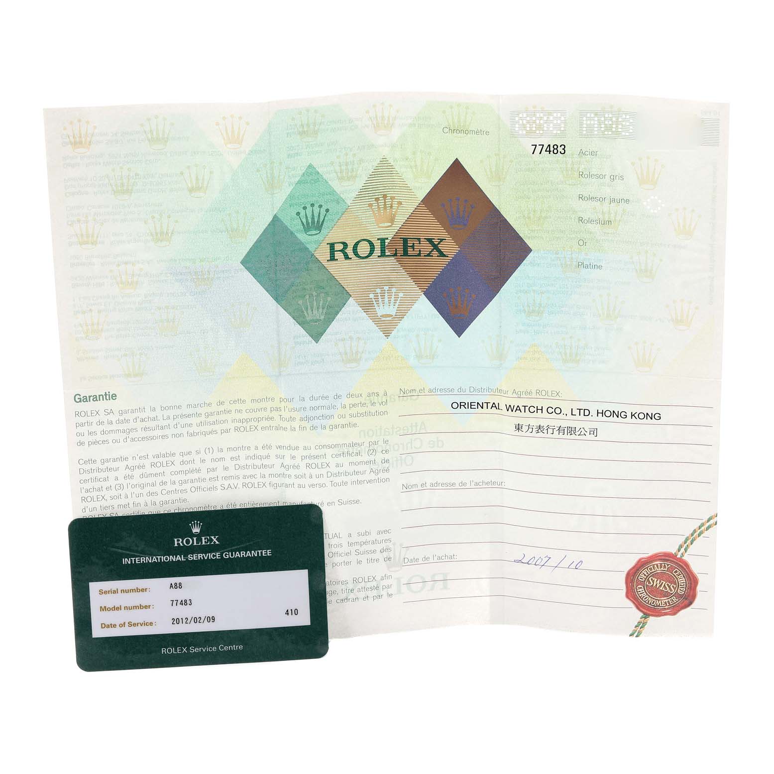 The image shows the warranty document and International Service Guarantee card for a Mid-Size Rolex watch.