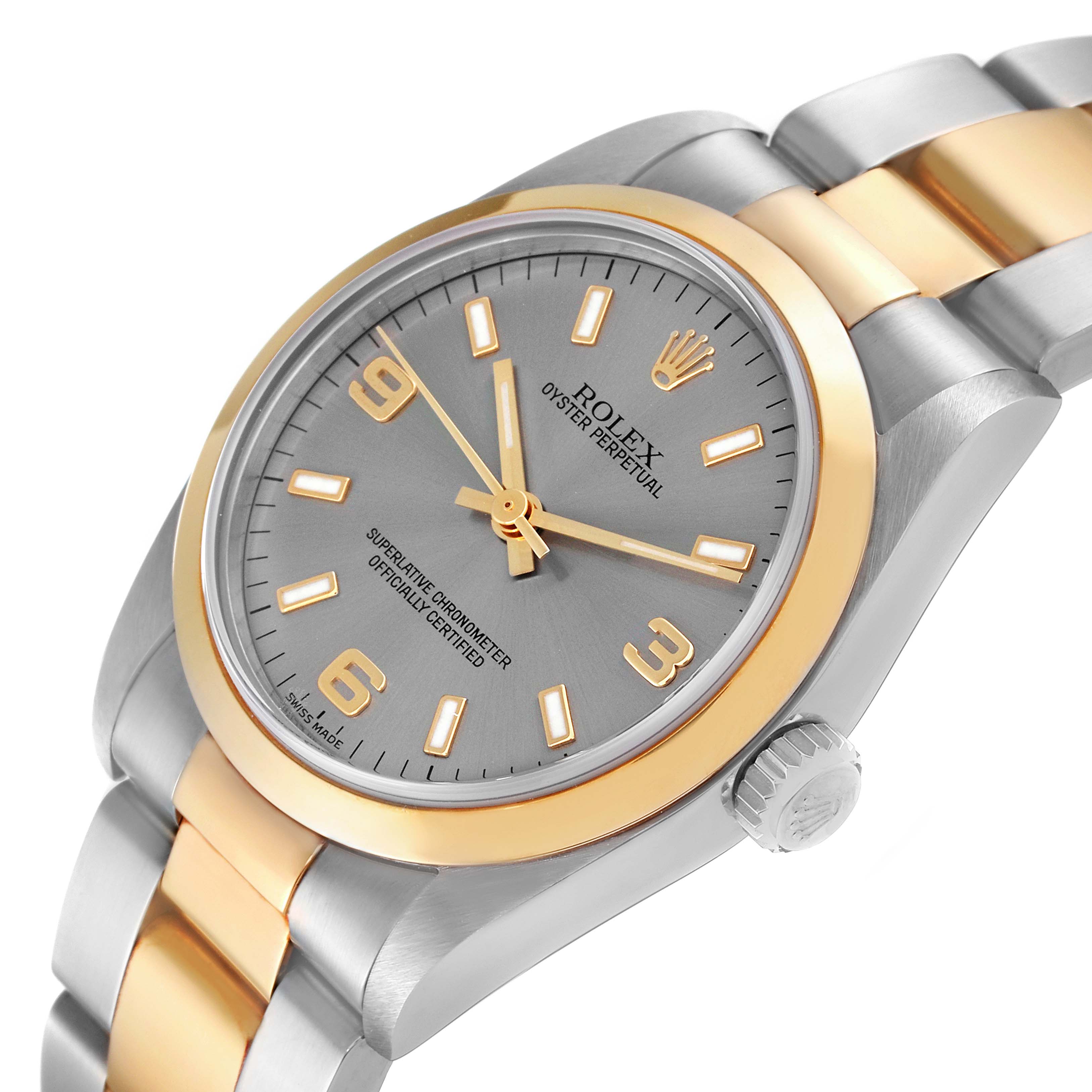 The image shows a Rolex Oyster Perpetual Mid-Size model watch, viewed from an angle showcasing the face, crown, and bracelet.