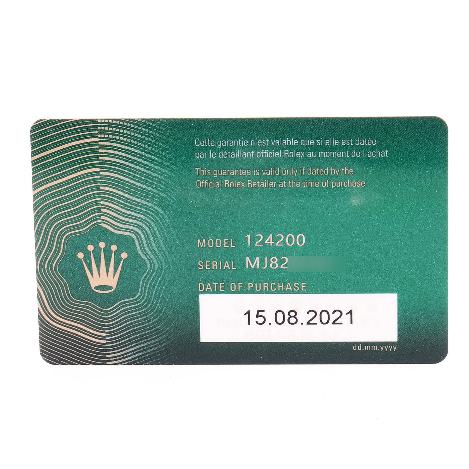 This image shows the warranty card for a Rolex Oyster Perpetual 124200 Men's Stainless Steel Pink Dial 124200 Men's Stainless Steel Pink Dial model 124200, including the serial number and purchase date.