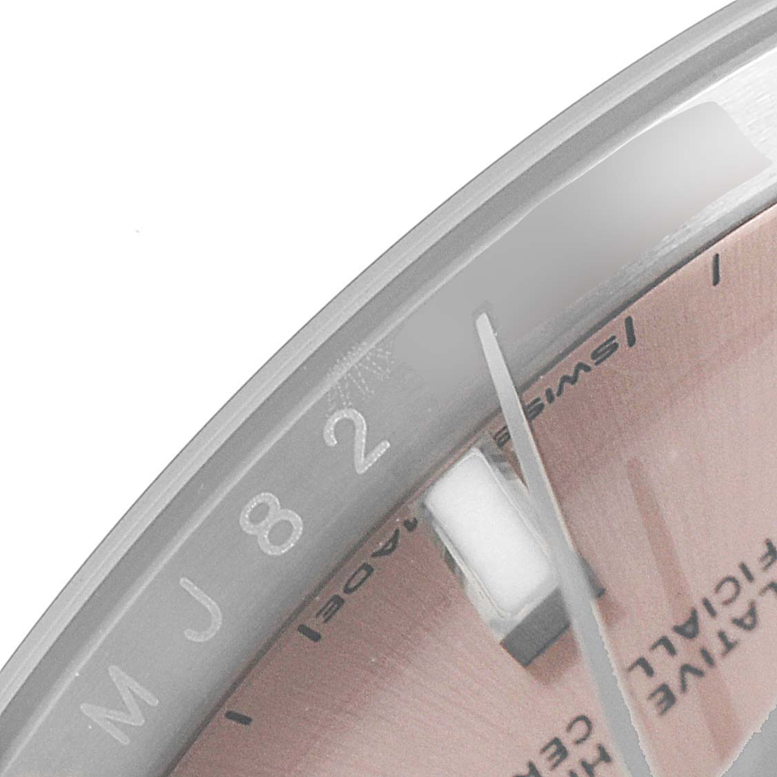 The image shows a close-up of the bezel and part of the dial of the Rolex Oyster Perpetual 124200 Men's Stainless Steel Pink Dial 124200 Men's Stainless Steel Pink Dial watch, highlighting the number 8.