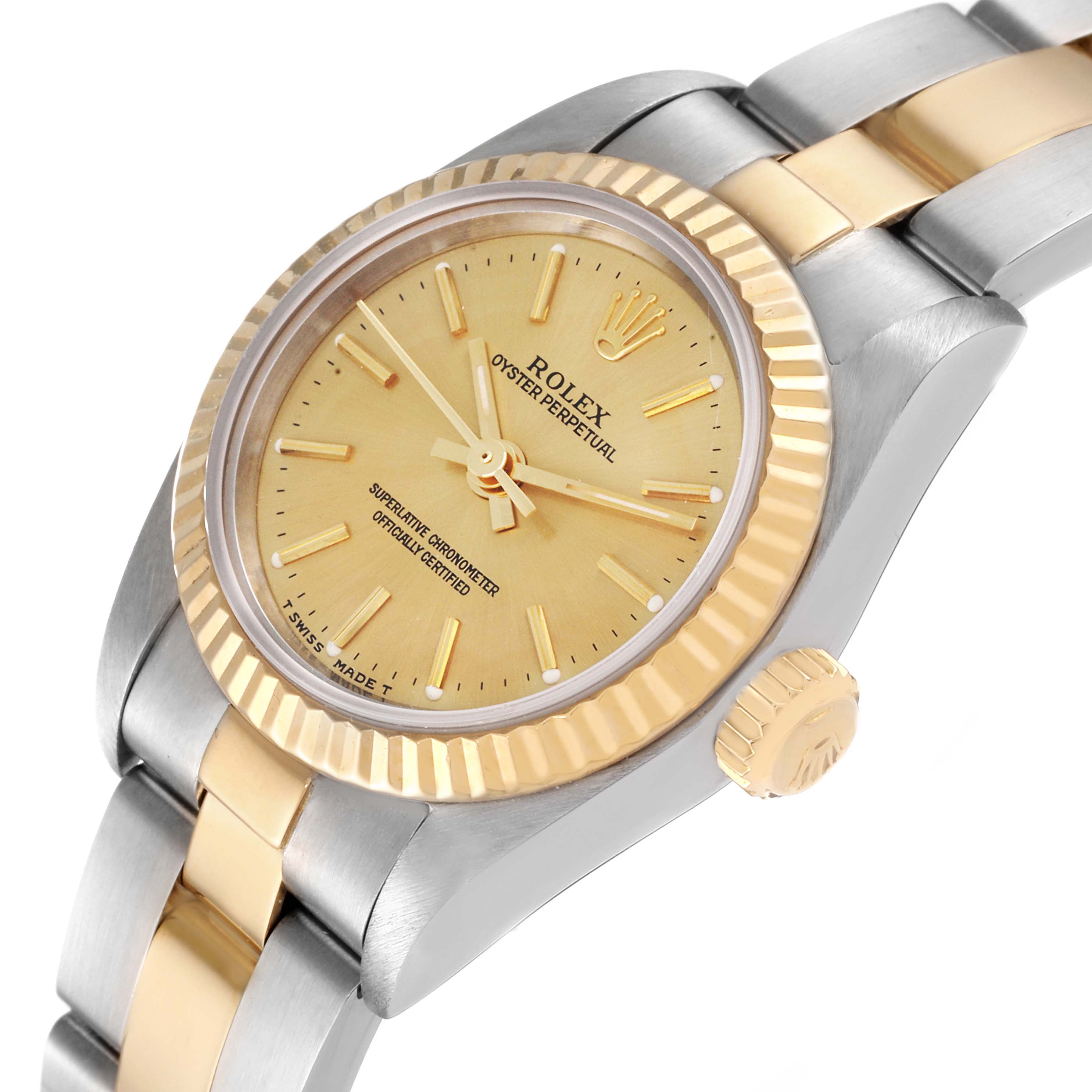 The image shows a close-up side angle of a Rolex Oyster Perpetual 67193 Women
s Steel and Gold (two tone) Champagne Dial 67193 Women
s Steel and Gold (two tone) Champagne Dial watch, highlighting its dial, crown, and part of the bracelet.