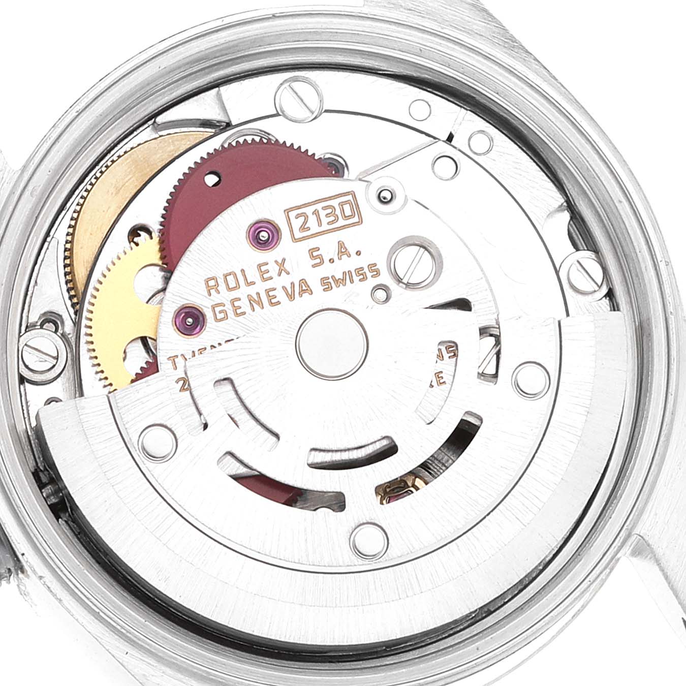 This is a close-up view of the movement inside a Rolex Oyster Perpetual 67193 Women
s Steel and Gold (two tone) Champagne Dial 67193 Women
s Steel and Gold (two tone) Champagne Dial watch, showing gears and internal mechanisms.