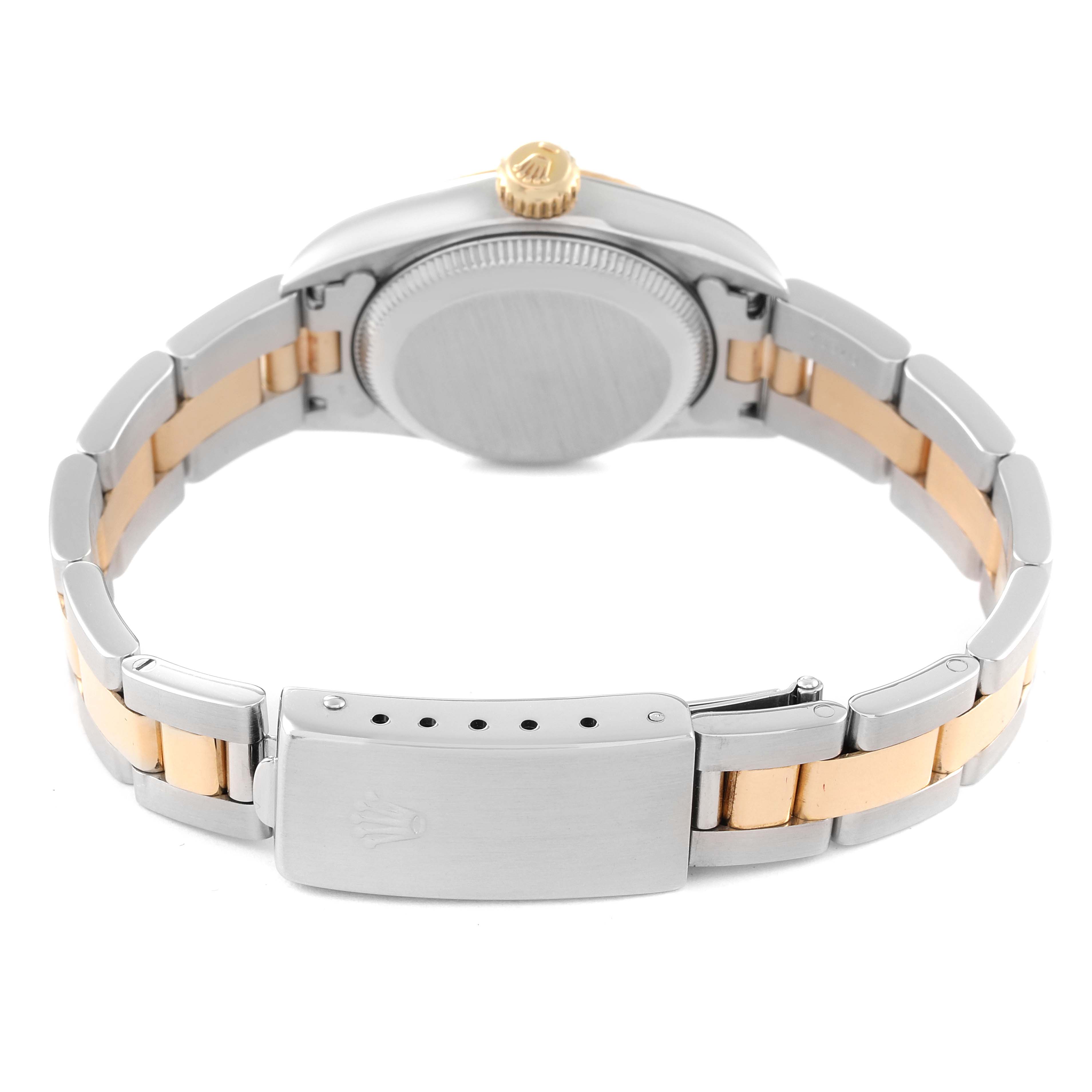 The image shows the back view of a Rolex Oyster Perpetual 67193 Women
s Steel and Gold (two tone) Champagne Dial 67193 Women
s Steel and Gold (two tone) Champagne Dial watch, highlighting the clasp and bracelet in silver with gold accents.