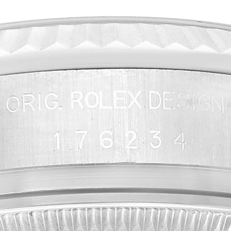 The image shows a close-up of the side engraving on a Rolex Oyster Perpetual 176234 Women's Stainless Steel Black Dial 176234 Women's Stainless Steel Black Dial watch case.