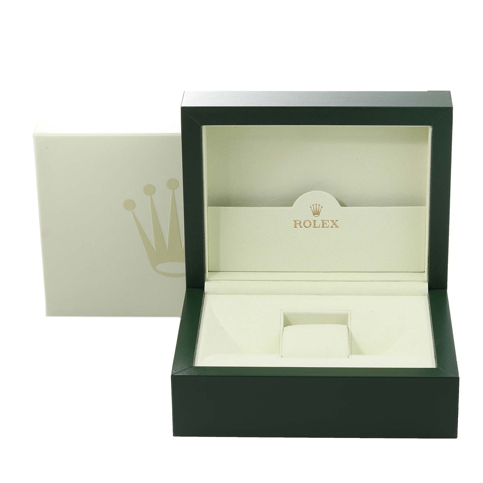 This image shows an open Rolex Pearlmaster 80298 Women's Yellow Gold Champagne Dial 80298 Women's Yellow Gold Champagne Dial watch box from a front angle, displaying the interior padding and Rolex logo.