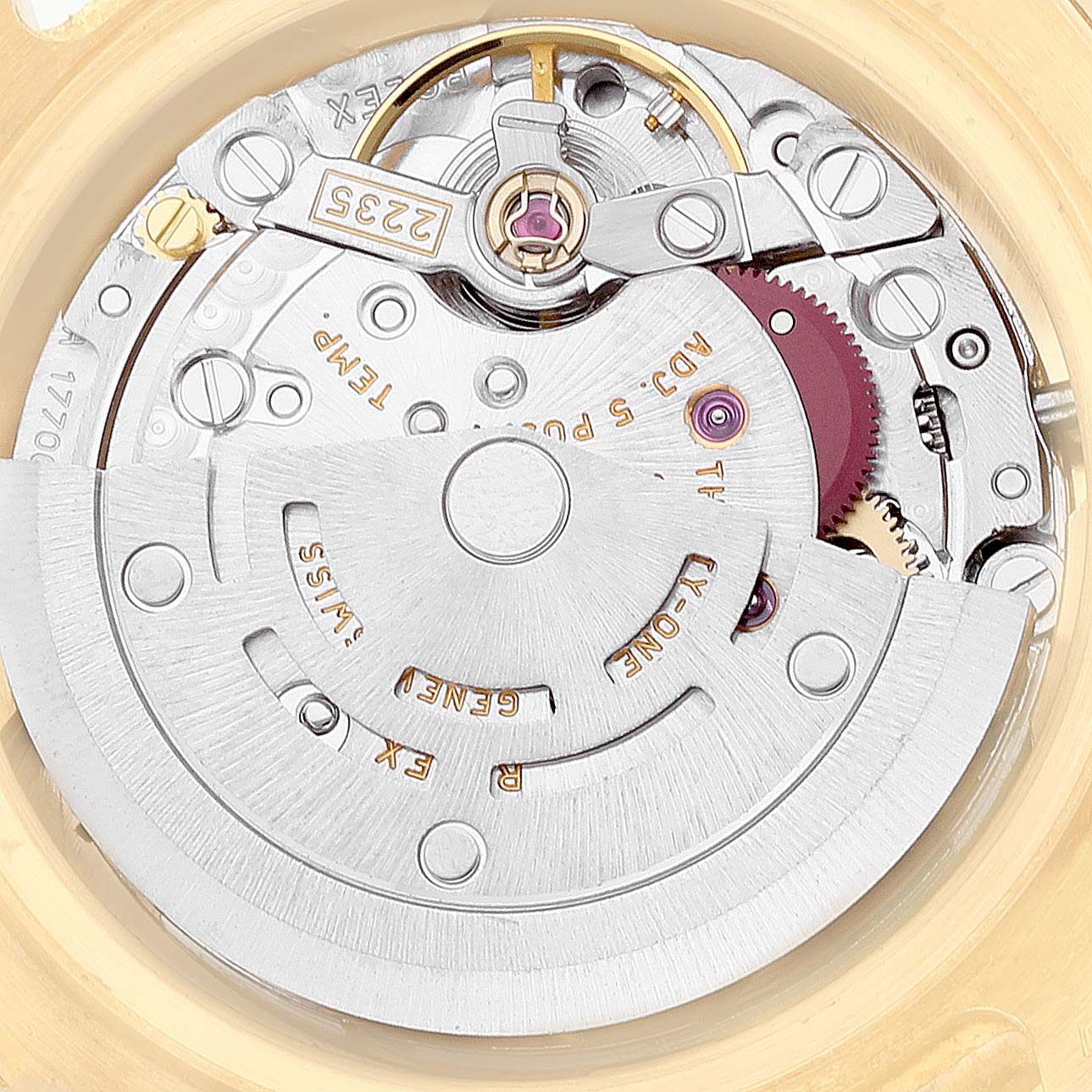 This image shows the intricate inner mechanical movement of a Rolex Pearlmaster 80298 Women's Yellow Gold Champagne Dial 80298 Women's Yellow Gold Champagne Dial watch from a top-down angle.