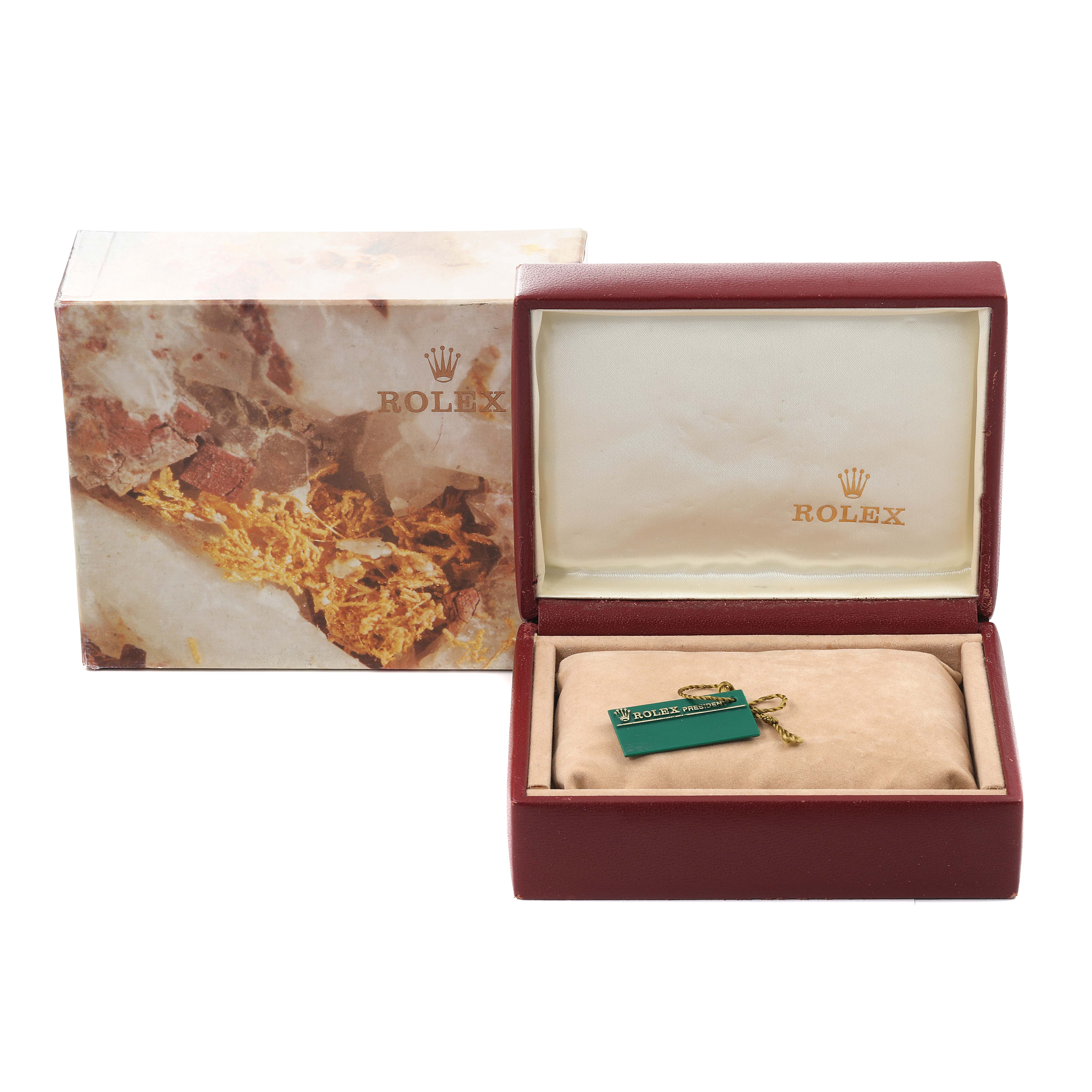 The image shows the packaging for a Rolex President 69179 Women's White Gold Silver Dial 69179 Women's White Gold Silver Dial model watch, including the outer box, inner case, and tag.