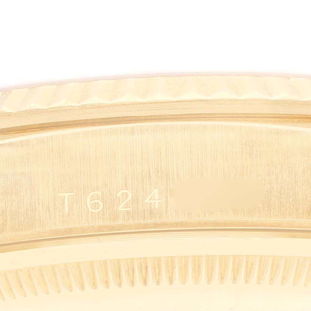 This image shows a close-up of the case side of a Rolex President 18238 Men
s Yellow Gold Champagne Dial 18238 Men
s Yellow Gold Champagne Dial model.