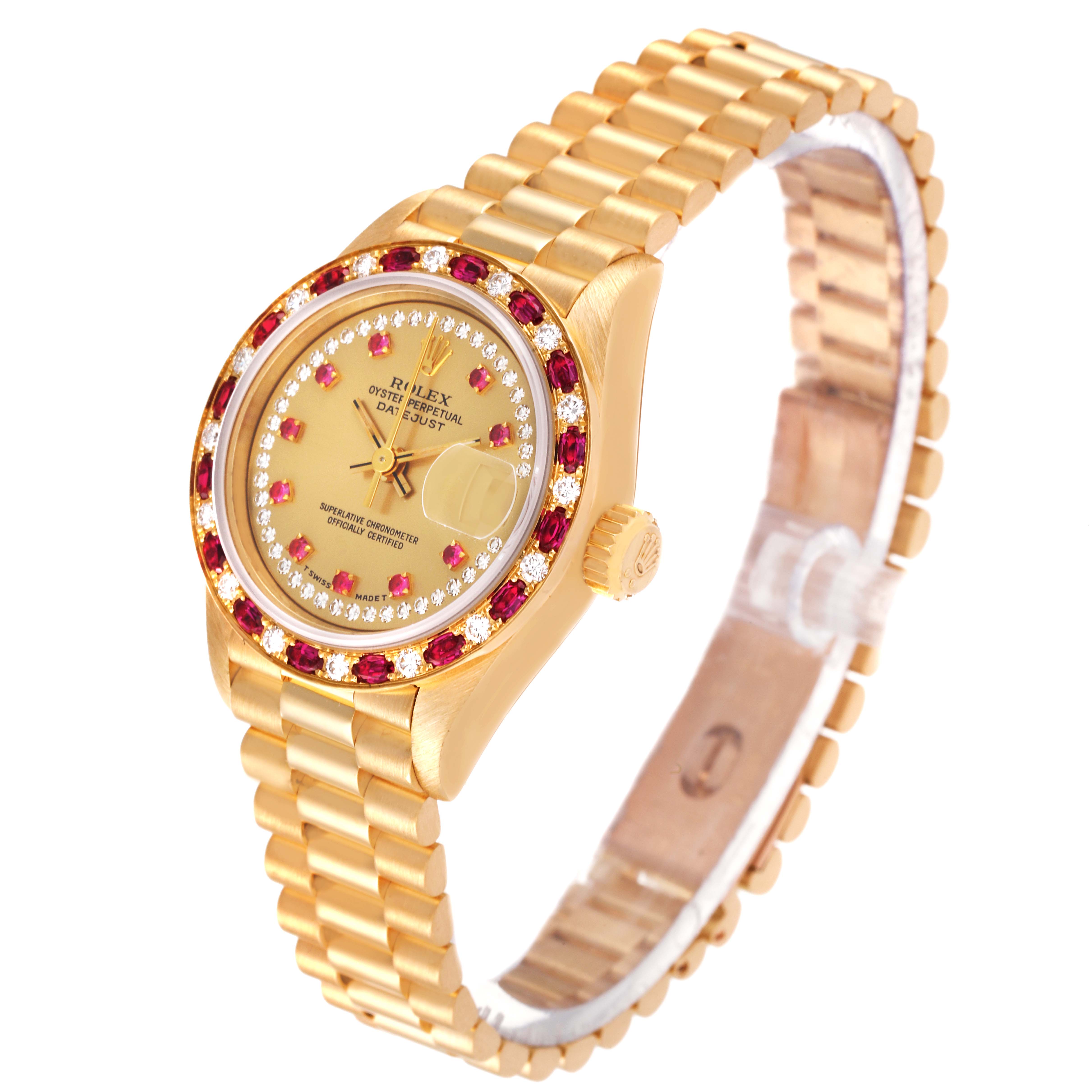 The image shows a Rolex President 69198 Women
s Yellow Gold Champagne Dial 69198 Women
s Yellow Gold Champagne Dial model watch at an angled side view, highlighting the gold band, case, and gemstone-encrusted bezel.