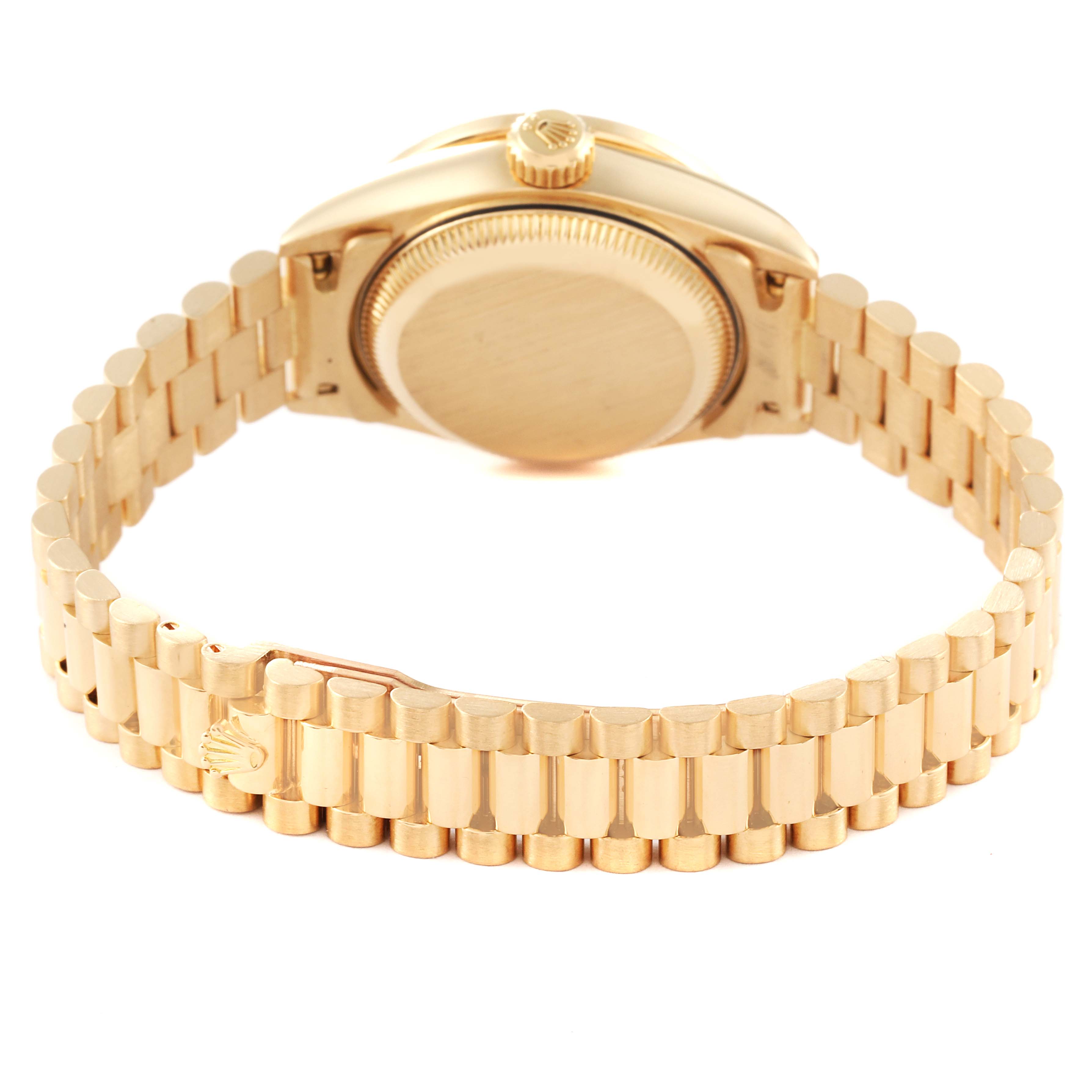 The image shows the back view of a Rolex President 69198 Women
s Yellow Gold Champagne Dial 69198 Women
s Yellow Gold Champagne Dial model watch, focusing on the bracelet and caseback.