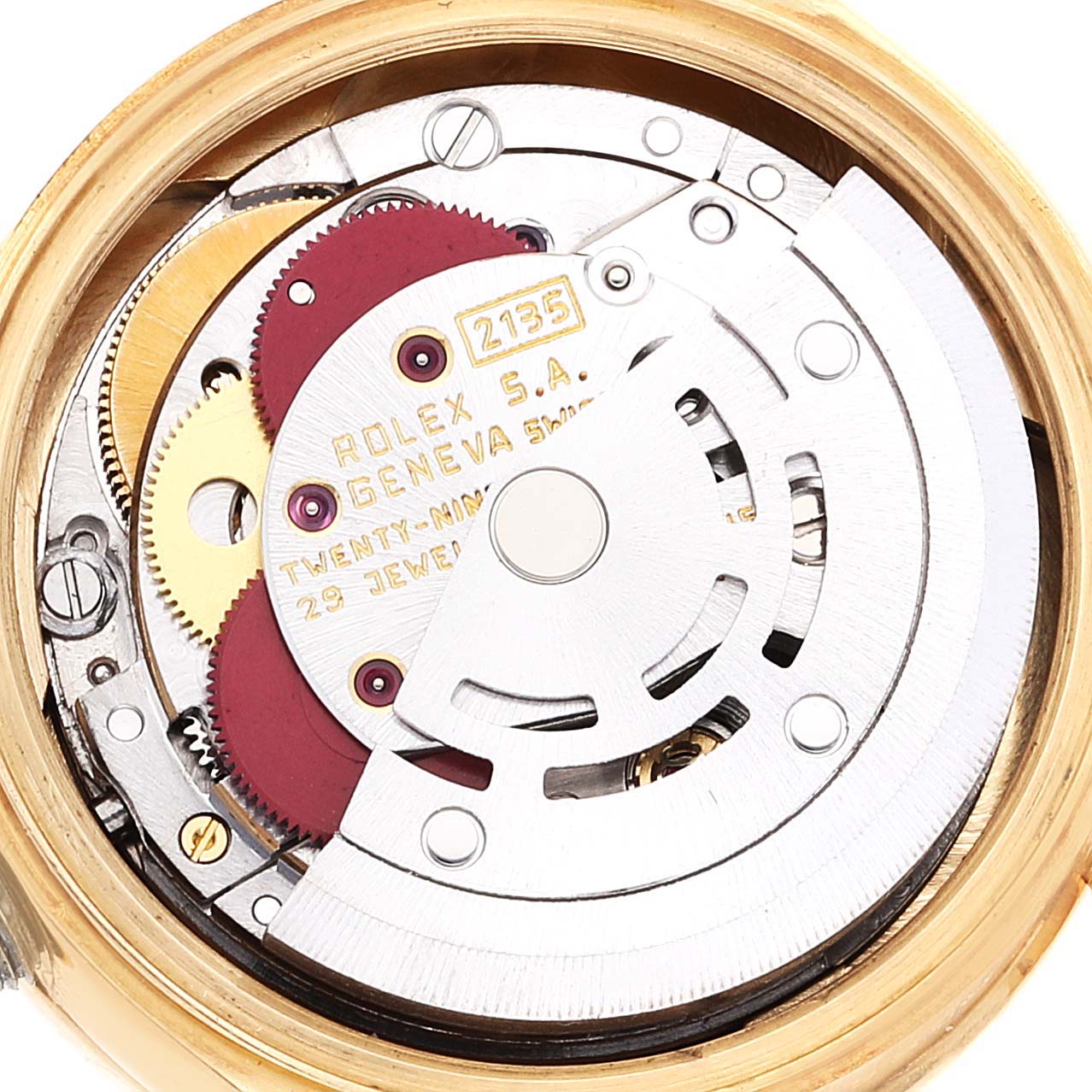 This image shows the intricate inner movement of a Rolex President 69288 Women's Yellow Gold Brown Dial 69288 Women's Yellow Gold Brown Dial model watch from a top-down angle.