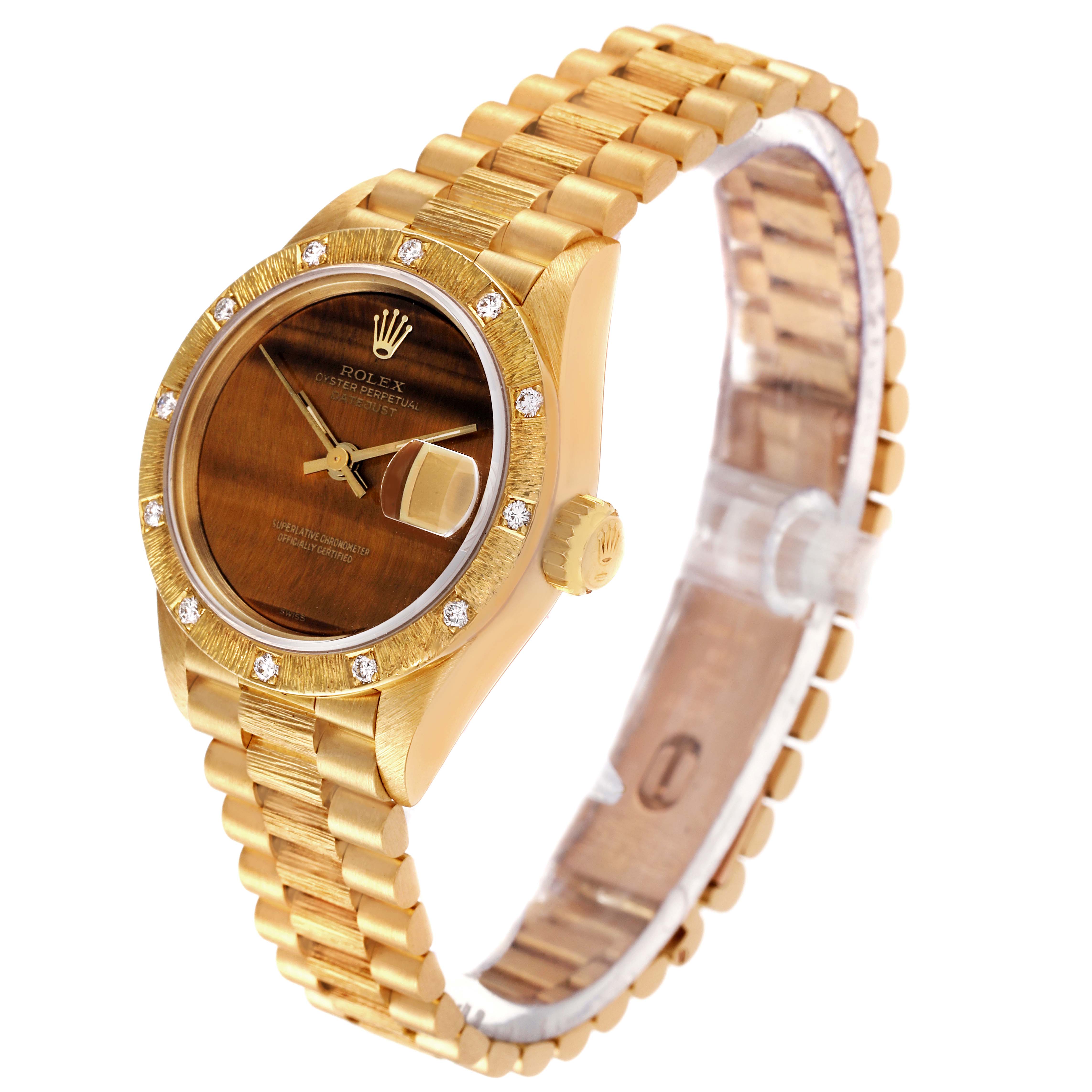 The image shows a Rolex President 69288 Women's Yellow Gold Brown Dial 69288 Women's Yellow Gold Brown Dial model watch at an oblique angle, highlighting its face, bezel, crown, and wristband.