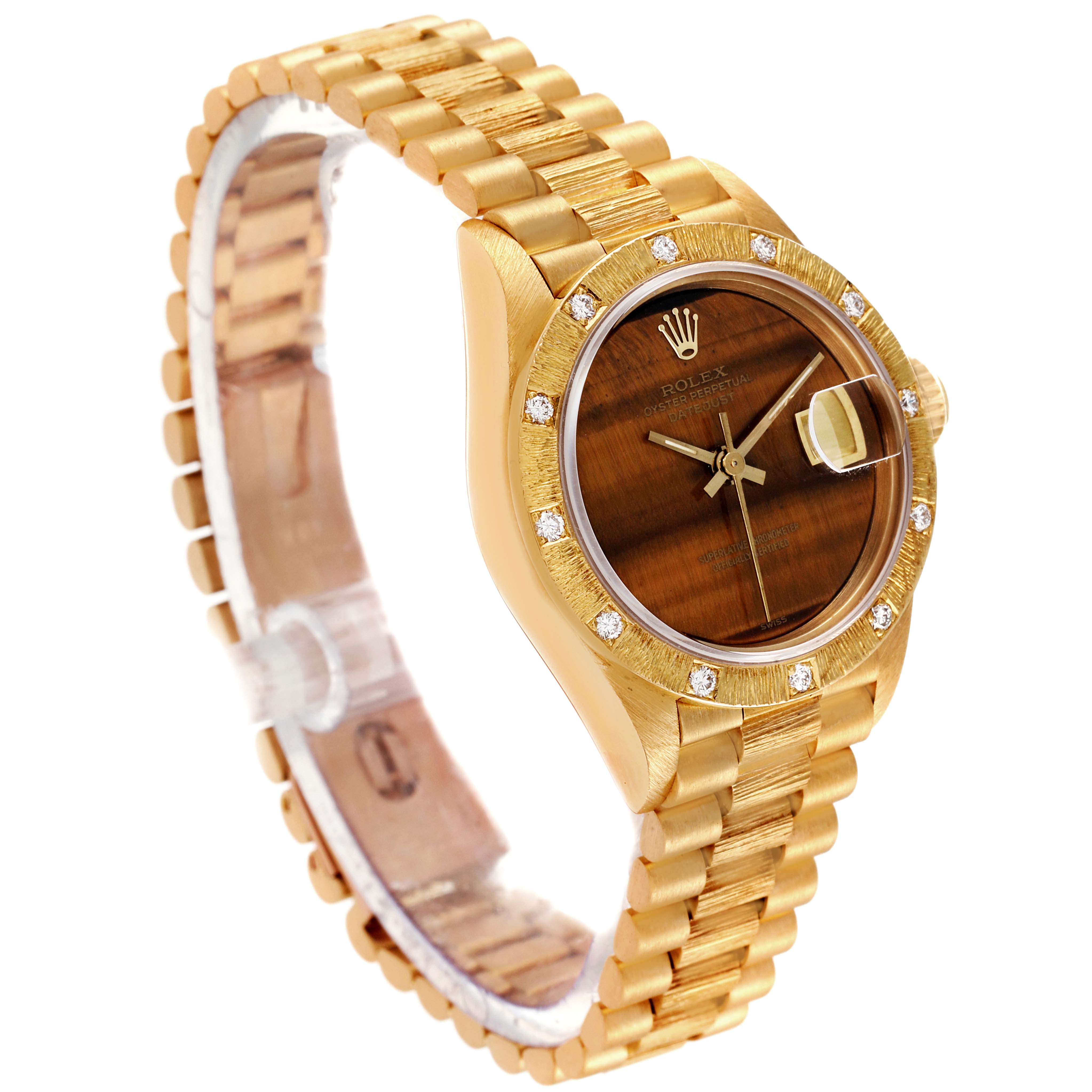 This image shows a Rolex President 69288 Women's Yellow Gold Brown Dial 69288 Women's Yellow Gold Brown Dial model watch at a slight side angle, highlighting its gold bracelet, dial, and bezel.