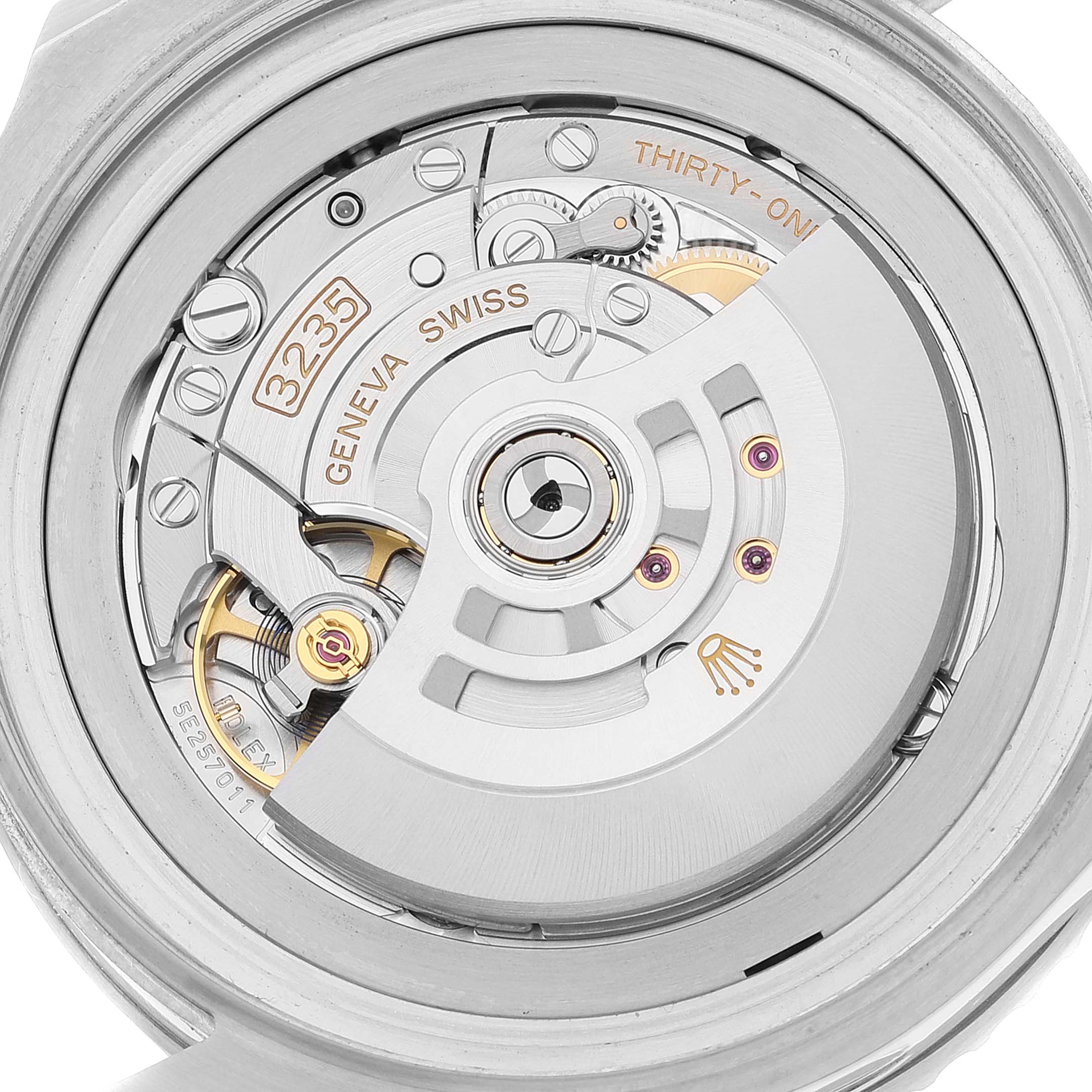 This image shows the back view of the movement inside a Rolex Sea-Dweller 126660 Men
s Stainless Steel Blue Dial 126660 Men
s Stainless Steel Blue Dial watch, displaying the intricate mechanical parts and engravings.