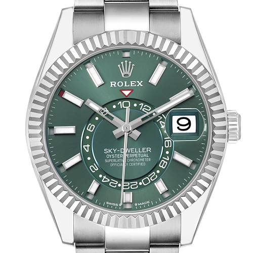 The Rolex Sky-Dweller 336934 Men's Stainless Steel Green Dial watch is shown from the front, highlighting its green dial, hands, date window, and fluted bezel.