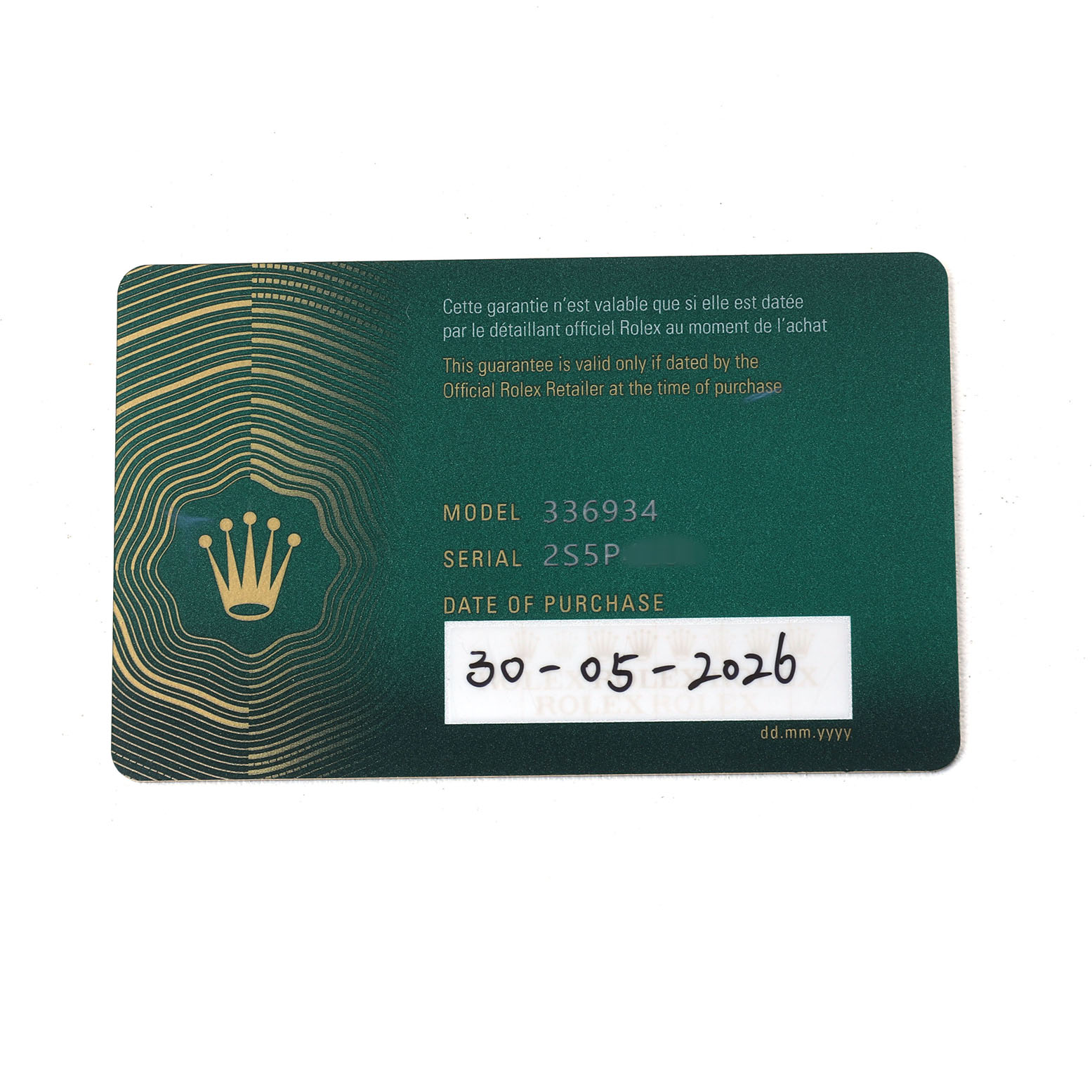The image shows the warranty card for a Rolex Sky-Dweller 336934 Men's Stainless Steel Green Dial, displaying model, serial number, and purchase date.